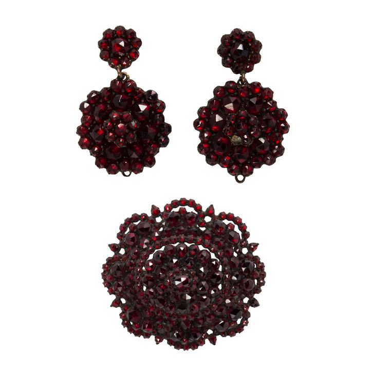 A bohemian garnet pair of earrings and brooch