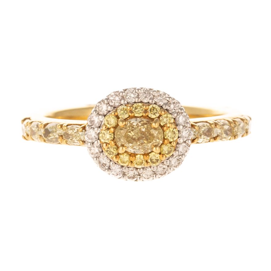 A Yellow Diamond Halo Ring in 18K