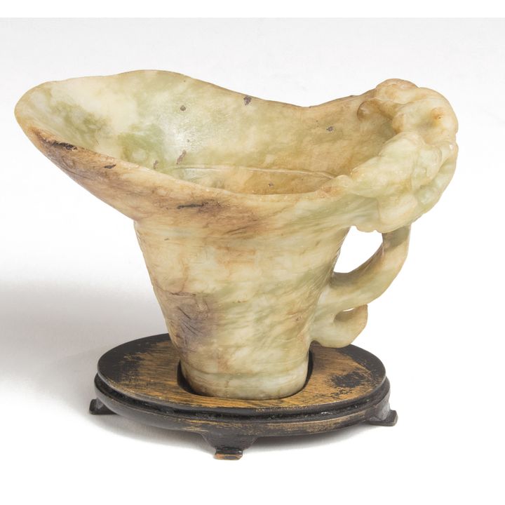 A Chinese jadeite libation cup with stand