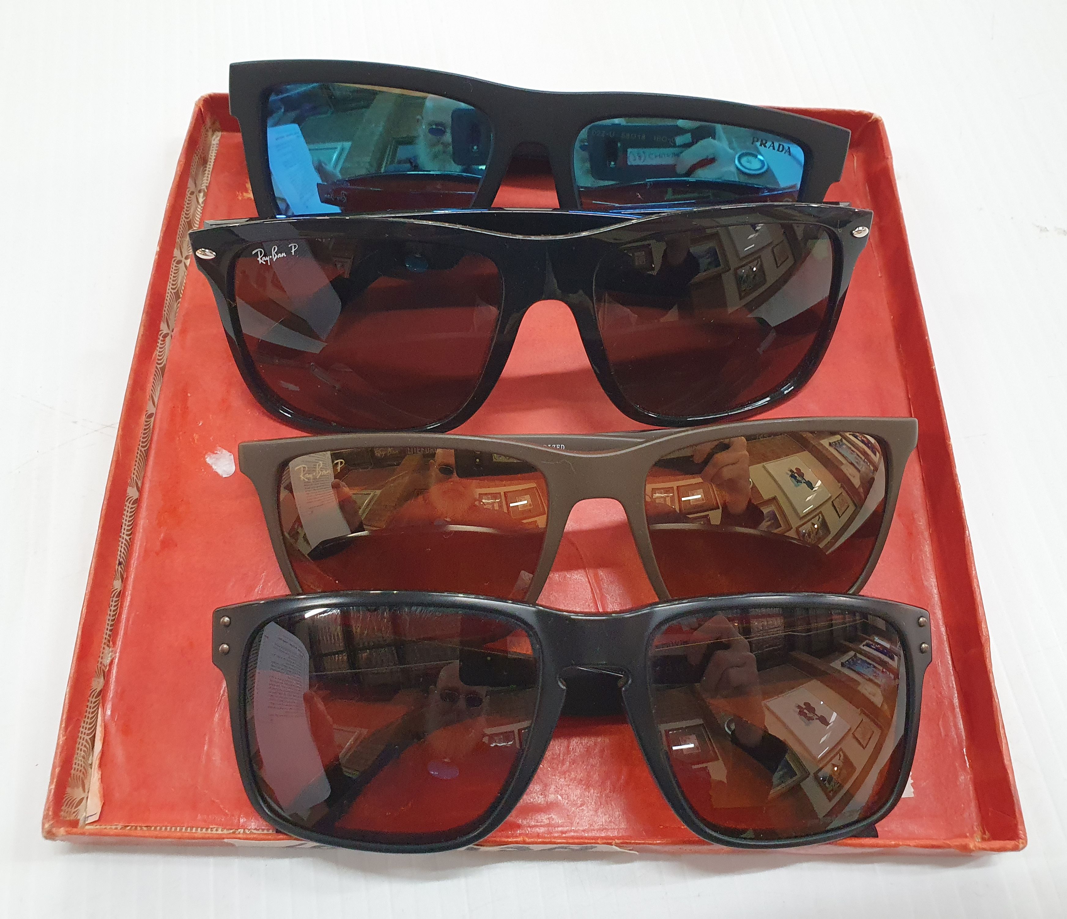 313A · FOUR PAIRS OF SUNGLASSES