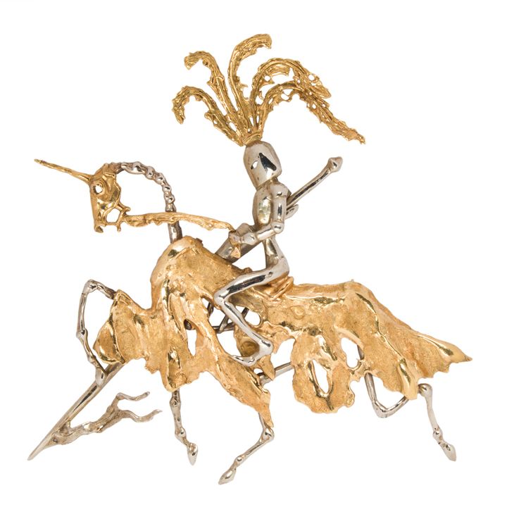 A 14k bi-color gold knight brooch