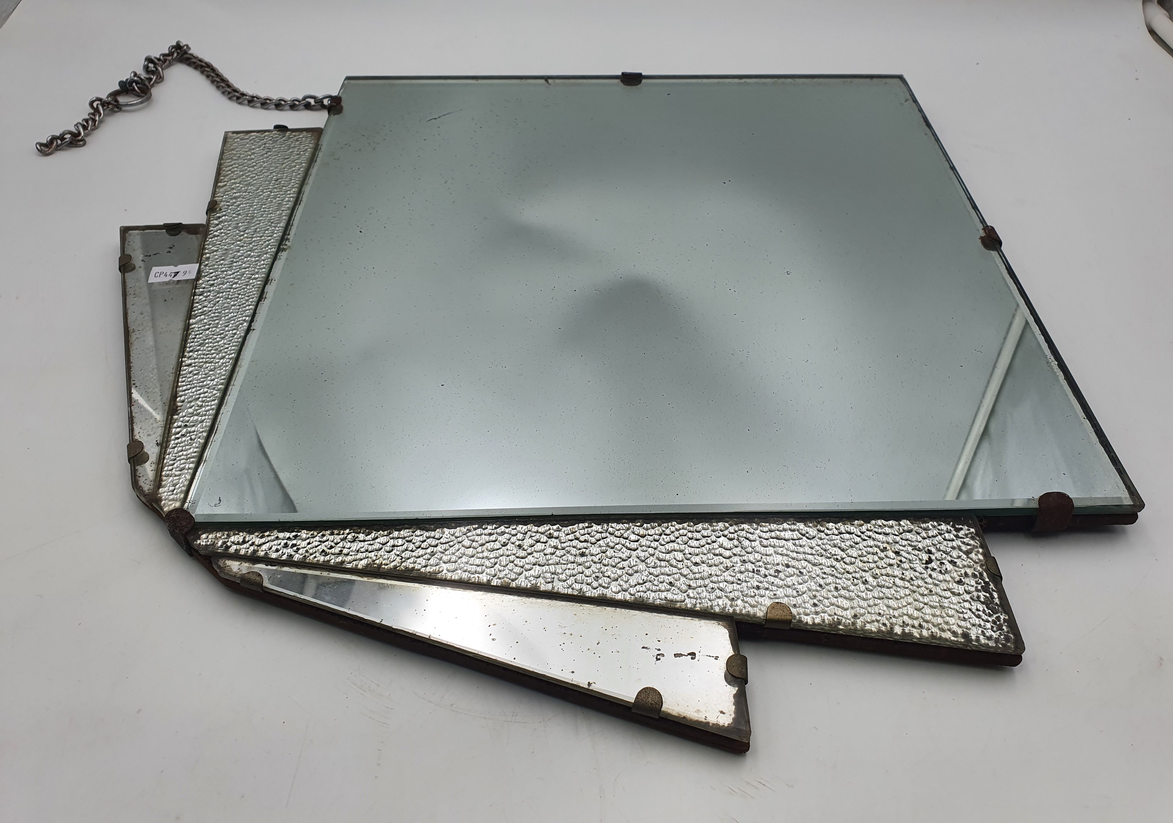 AN ART DECO MIRROR