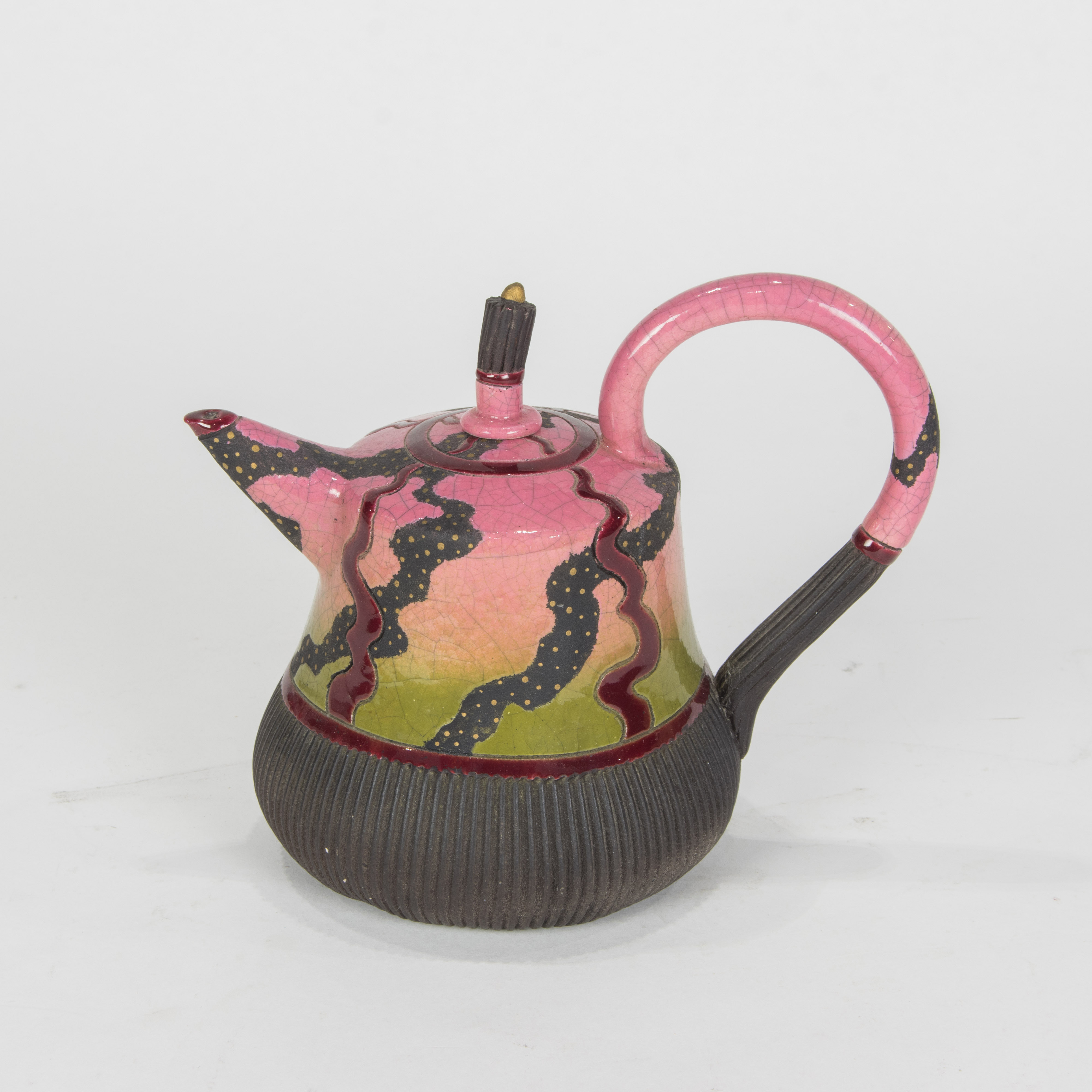 A Beverely Saito partial glazed ceramic teapot