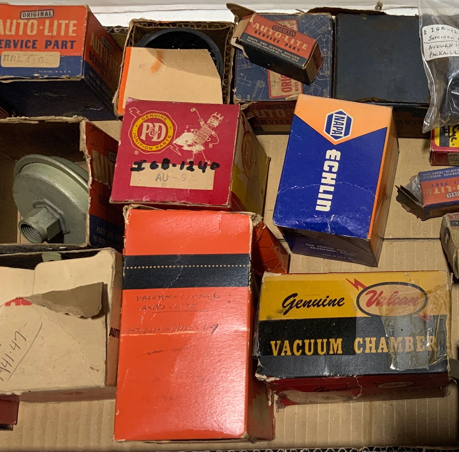 ASSORTED DISTRIBUTER CAPS AND IGNITION PARTS. Teel Auctions