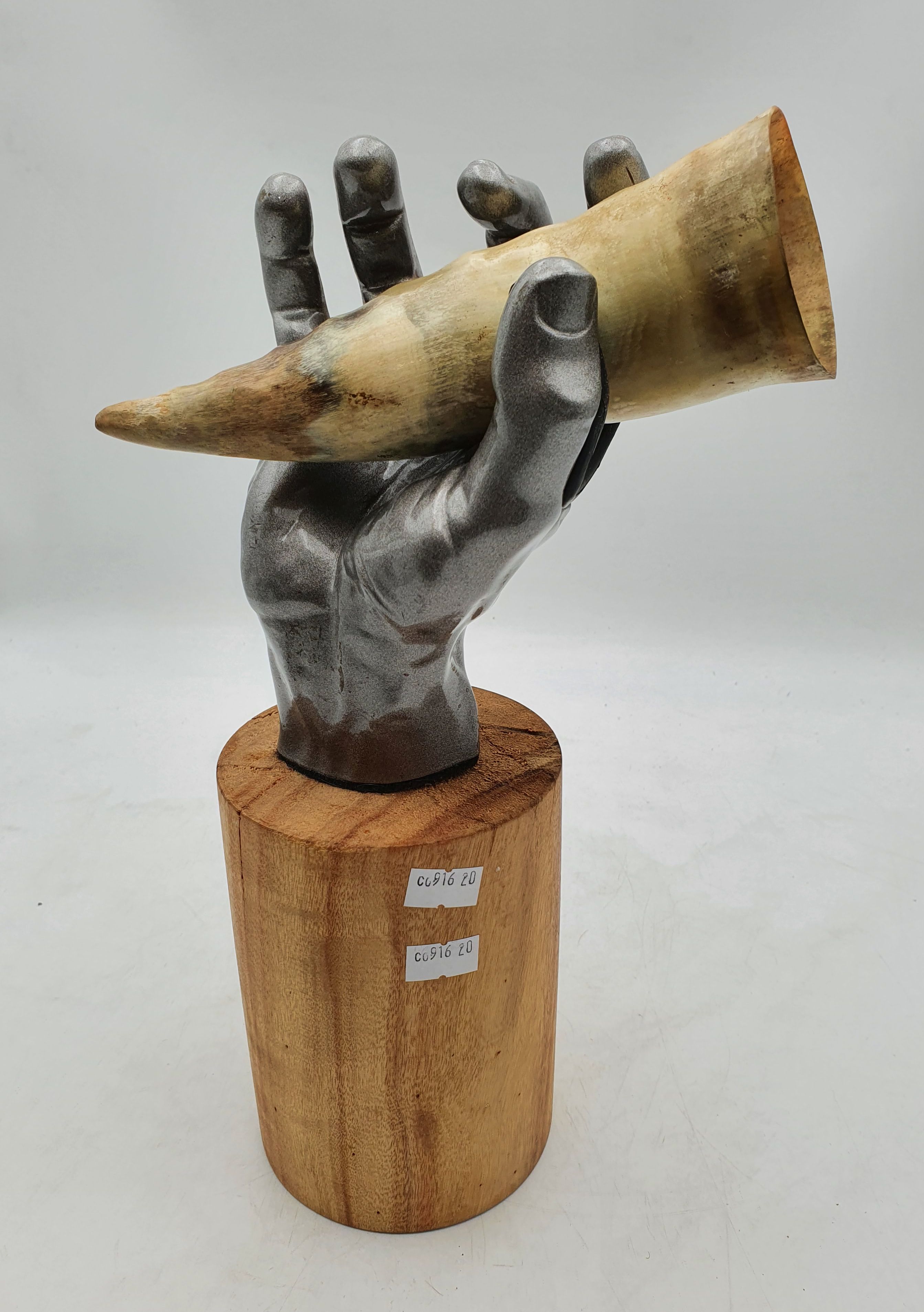 653 · A HAND SCULPTURE