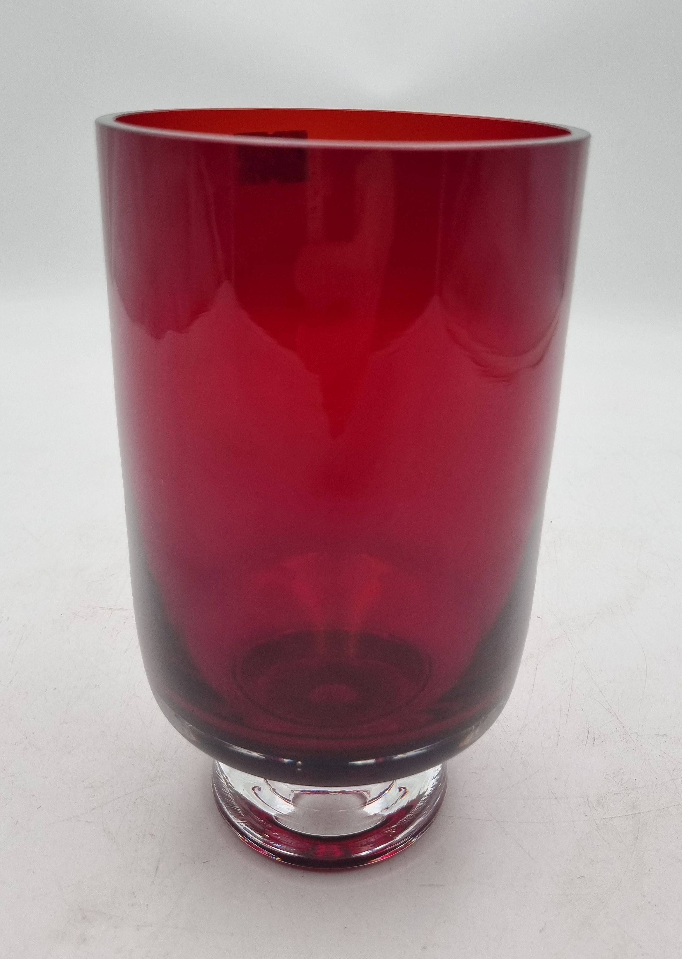 150 · A SCANDINAVIAN MODERN RUBY RED AND CLEAR FOOTED PEDESTAL ART GLASS VASE