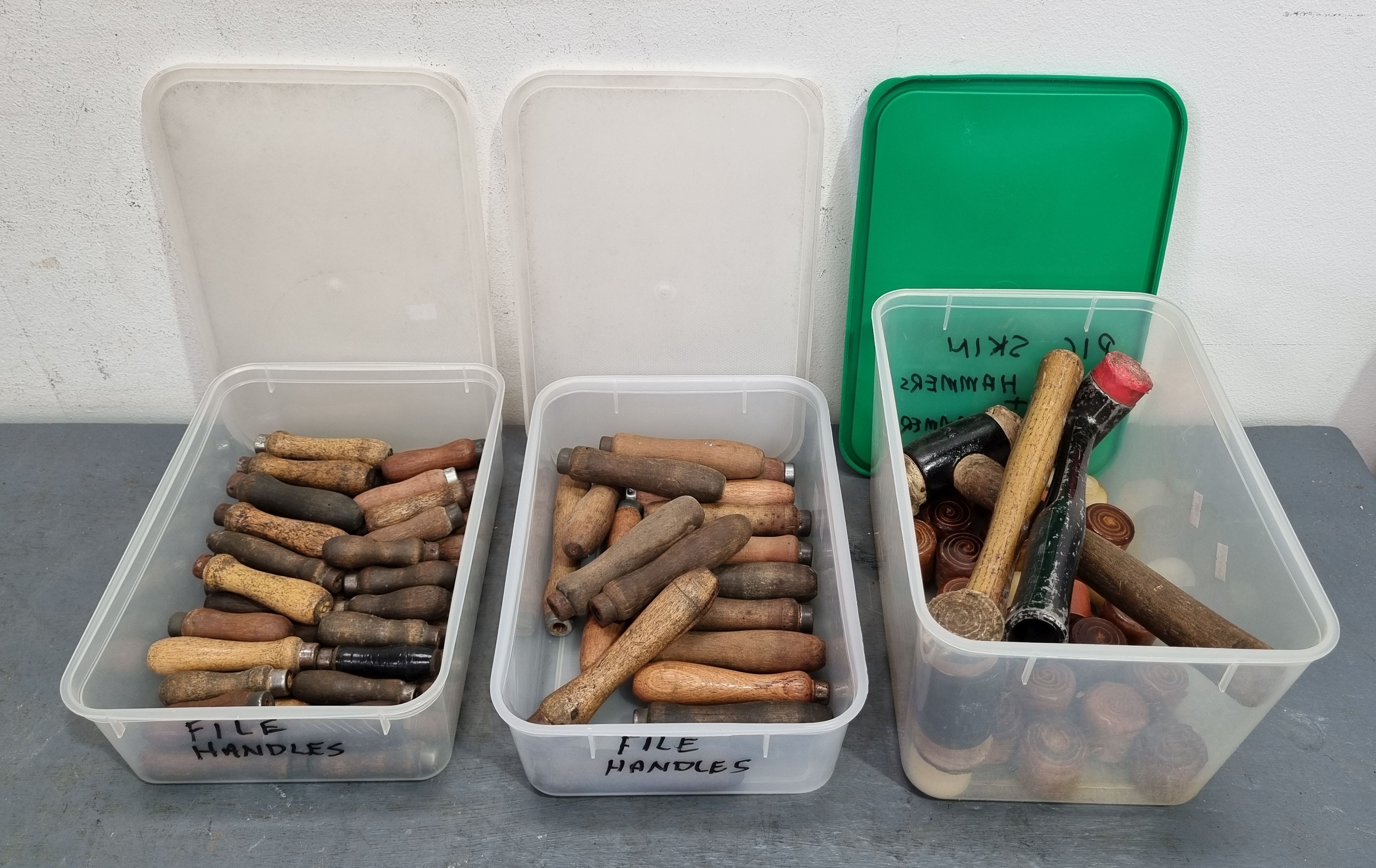 A Group Of Wooden Hammers And Handles