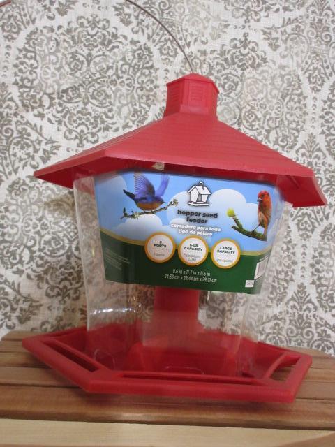 Garden Treasures Red Clear Plastic Hopper Bird Feeder Bc Auctions