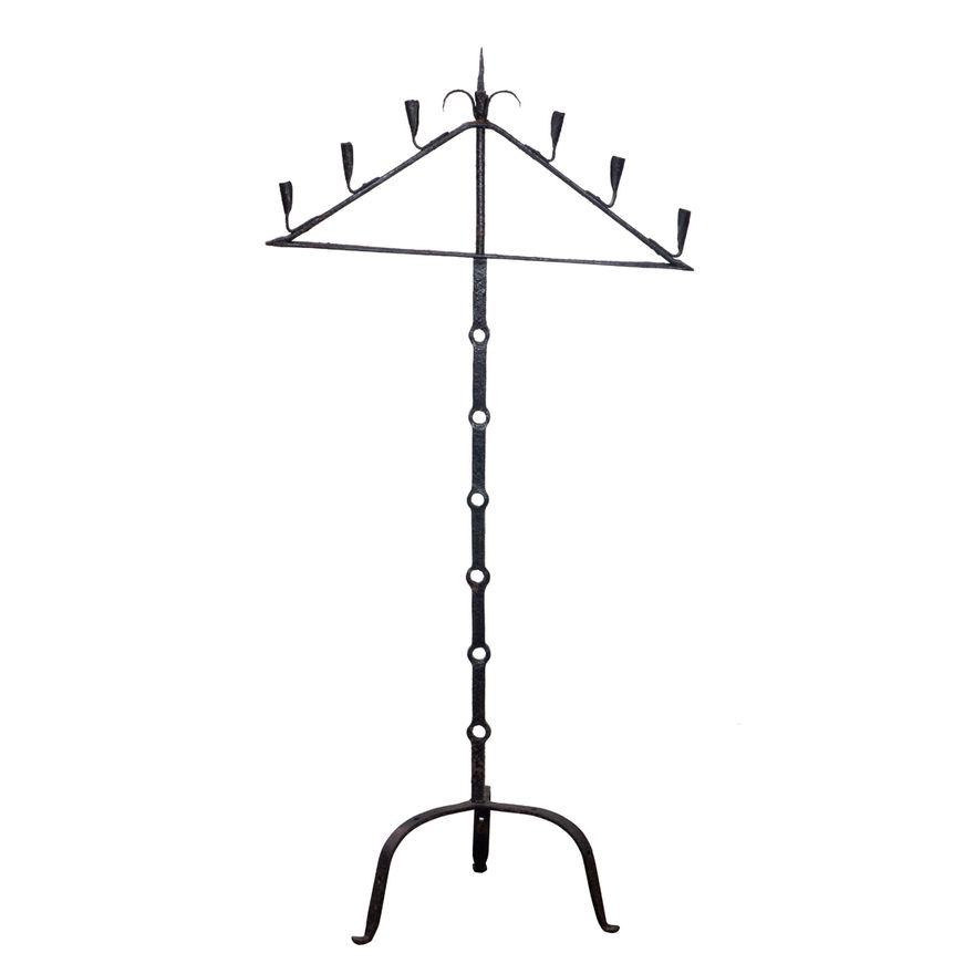 A Spanish Revival style wrought iron torchiere