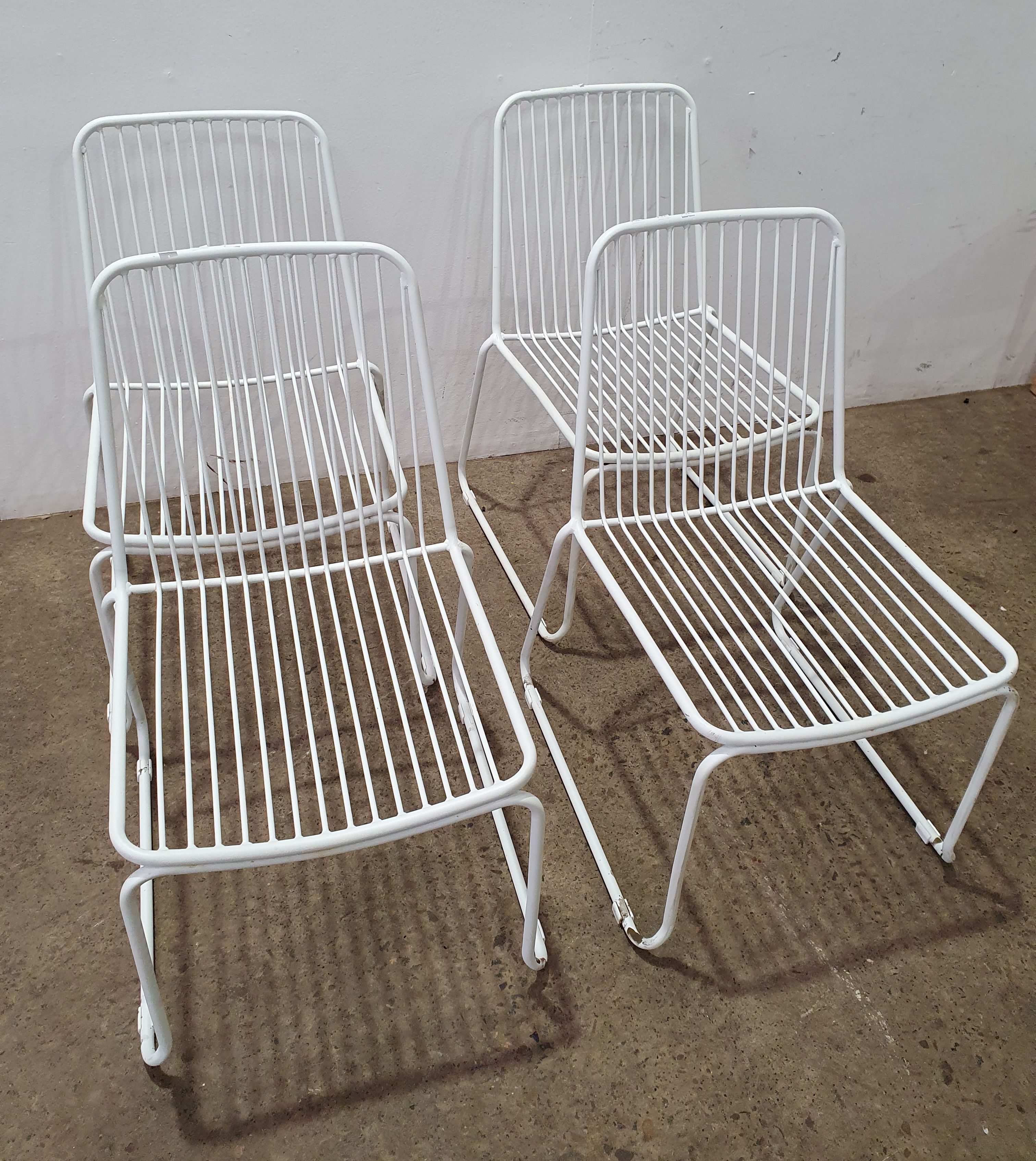 1089 · A SET OF FOUR METAL CHAIRS