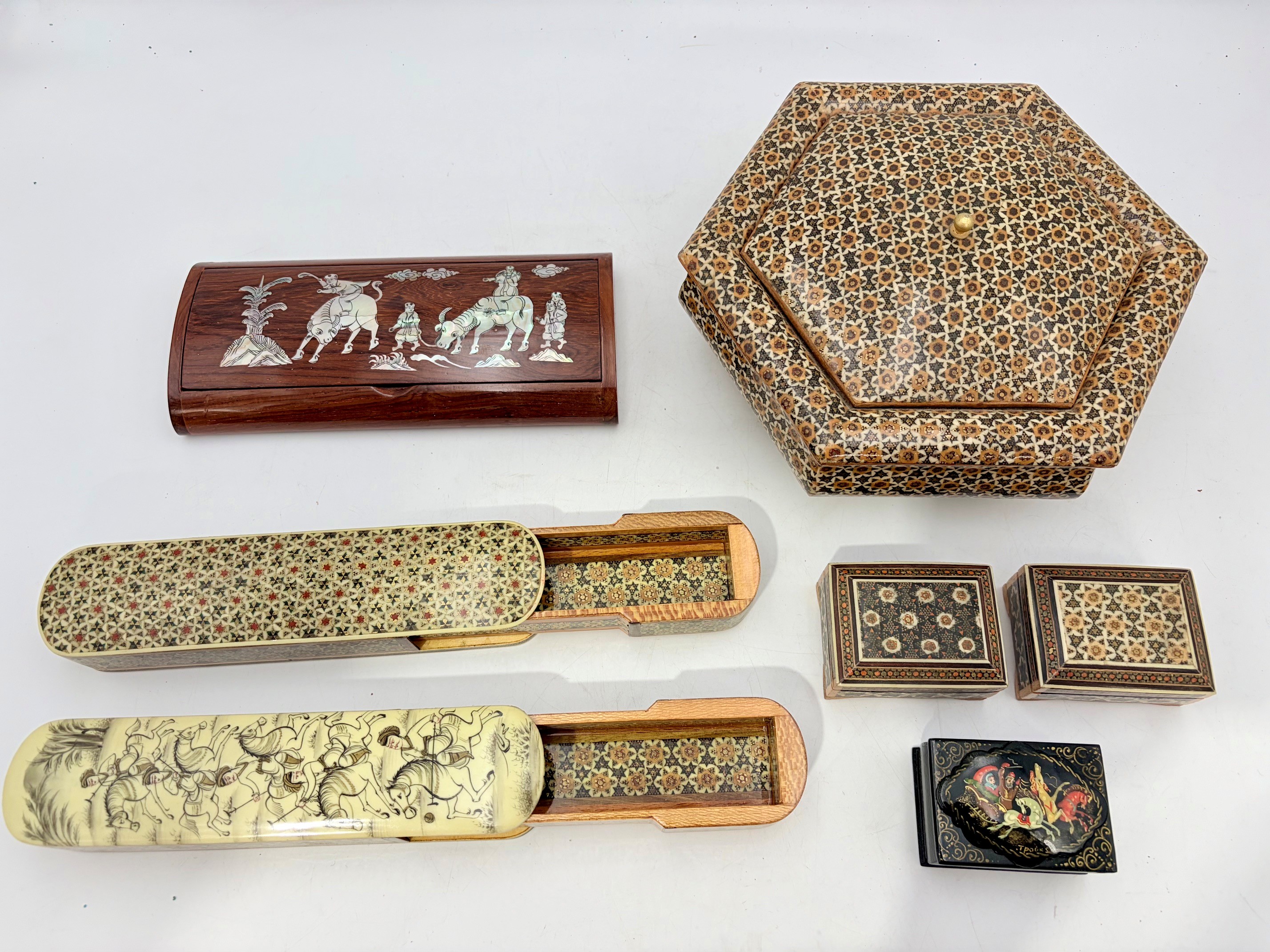 A Group Of Various Khatama Boxes