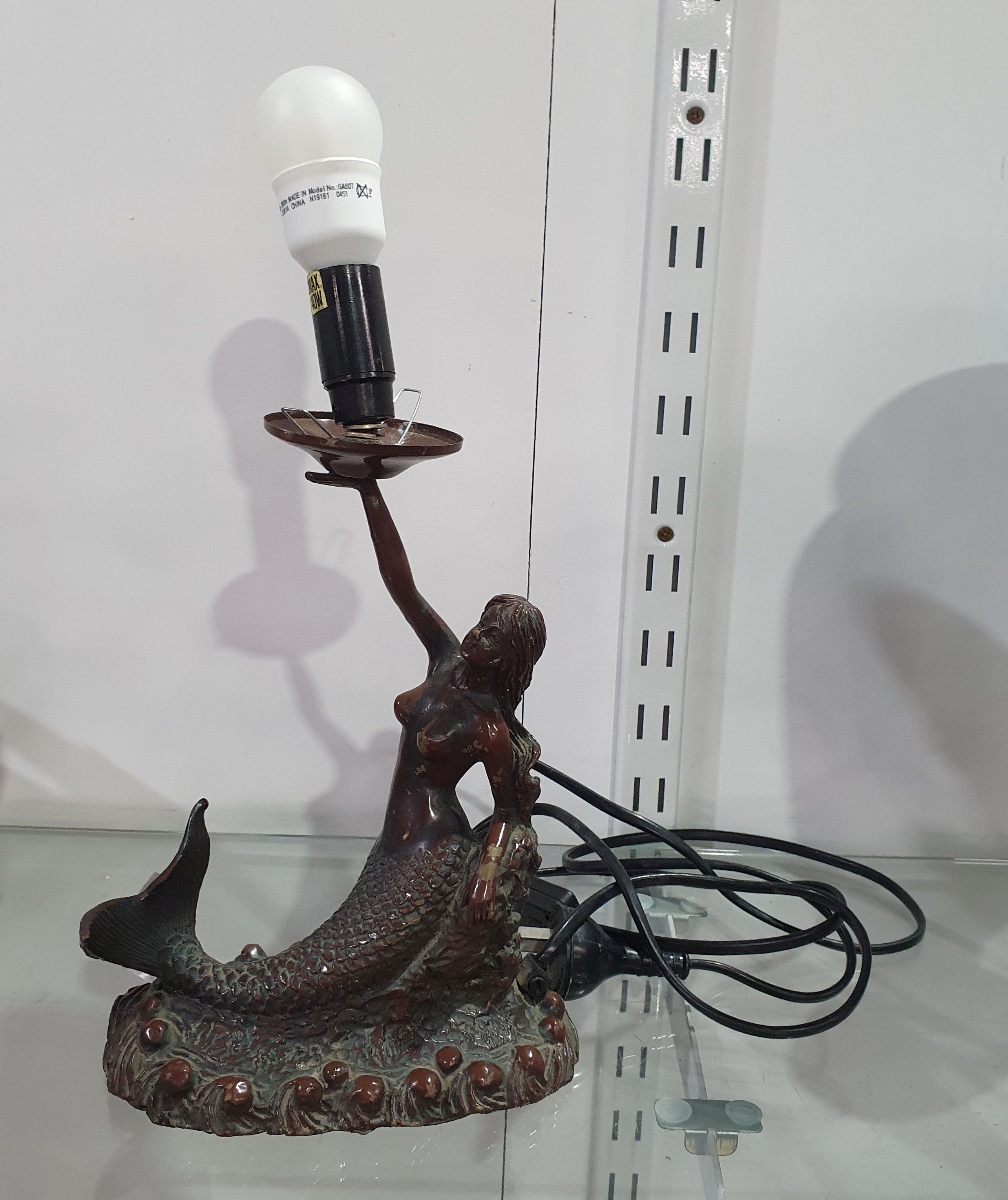 A Bronzed Figural Table Lamp