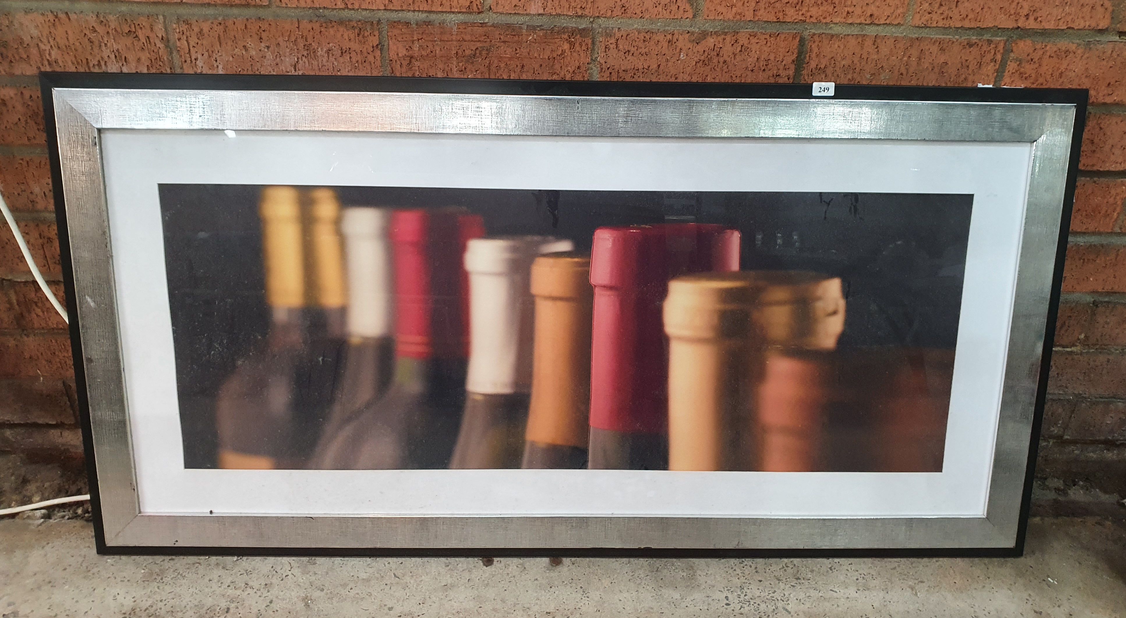 249 · A FRAMED PHOTOGRAPH
