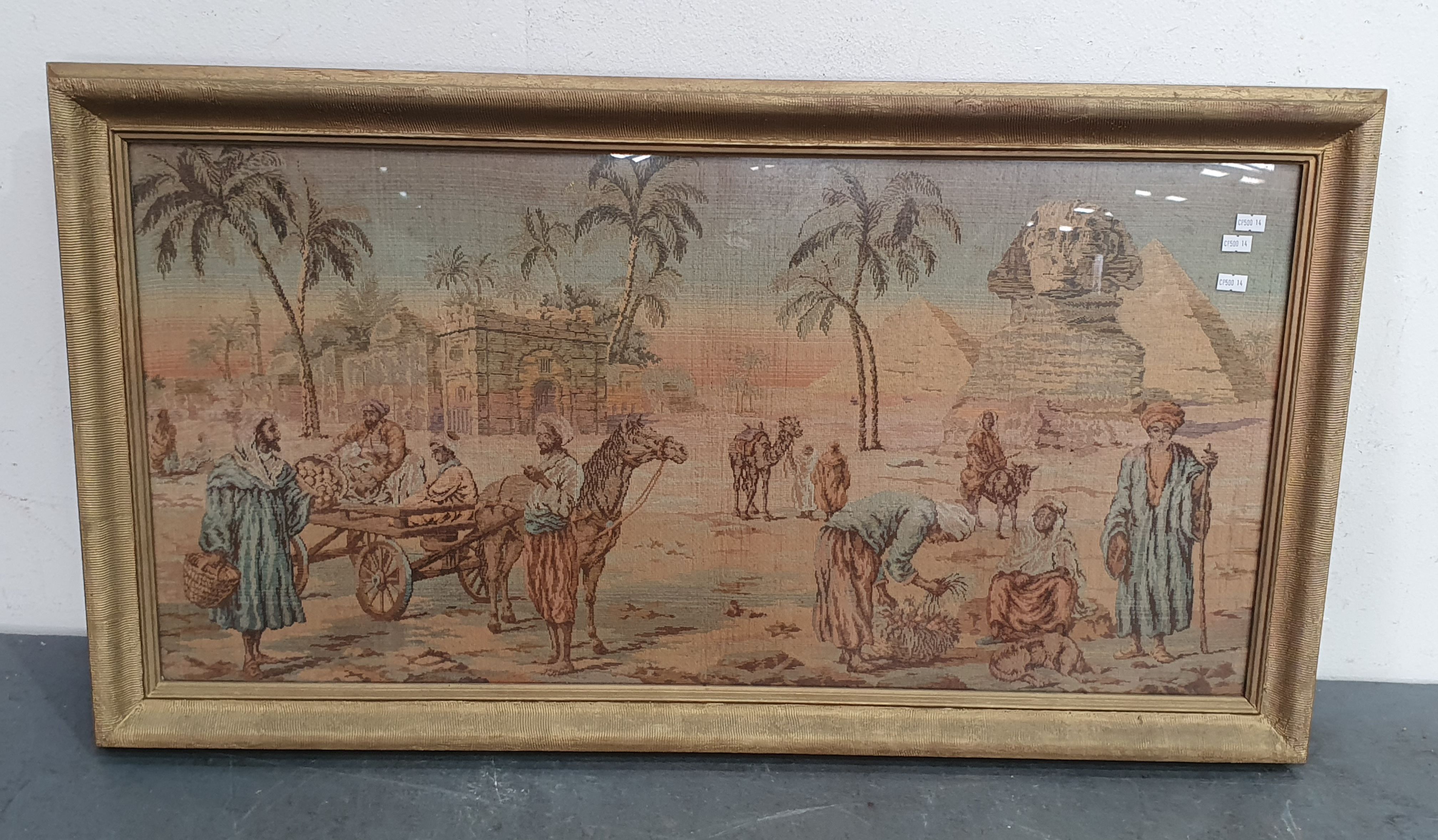 A FRAMED TAPESTRY