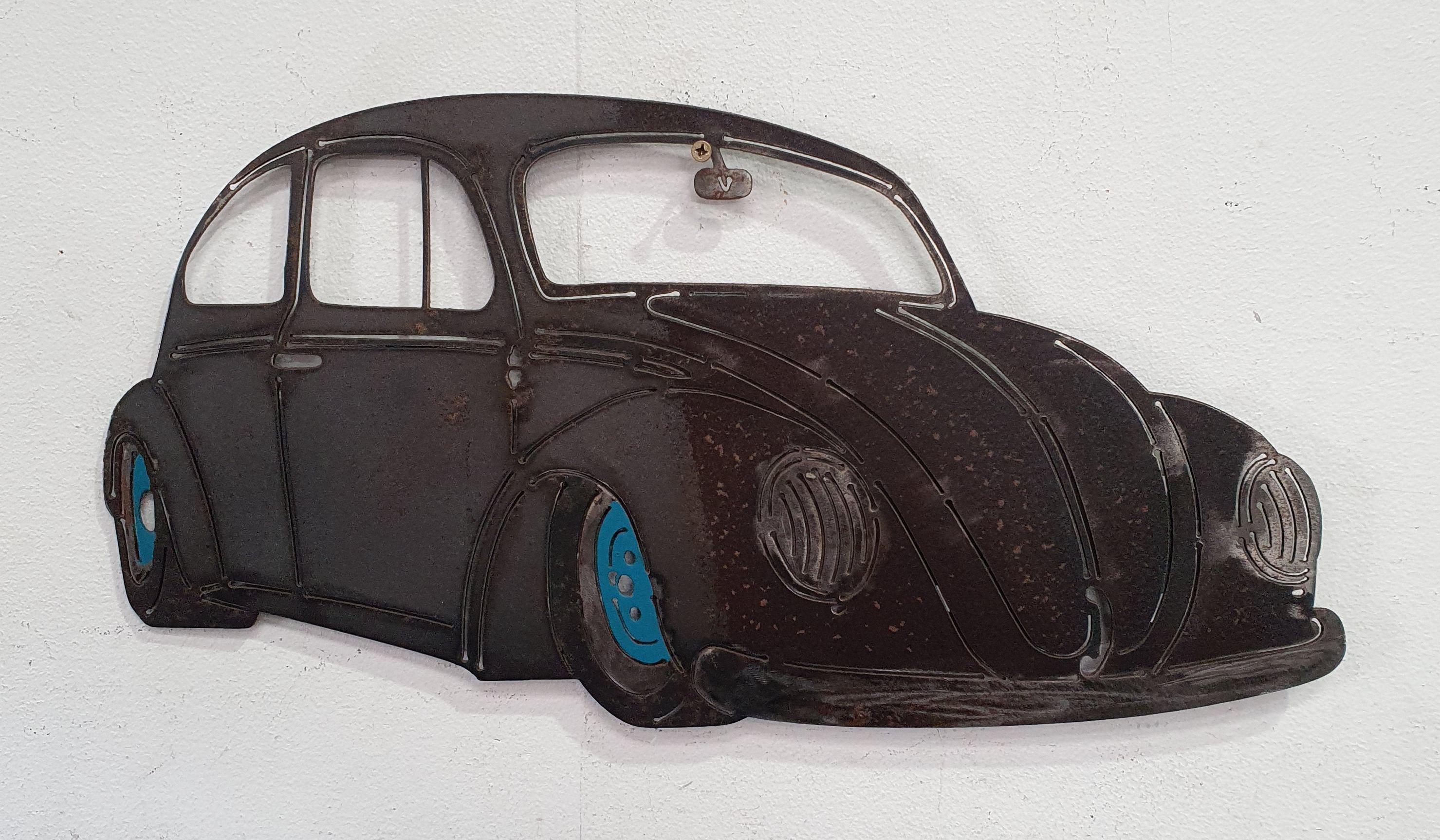 A STEEL VW BEETLE WALL HANGING