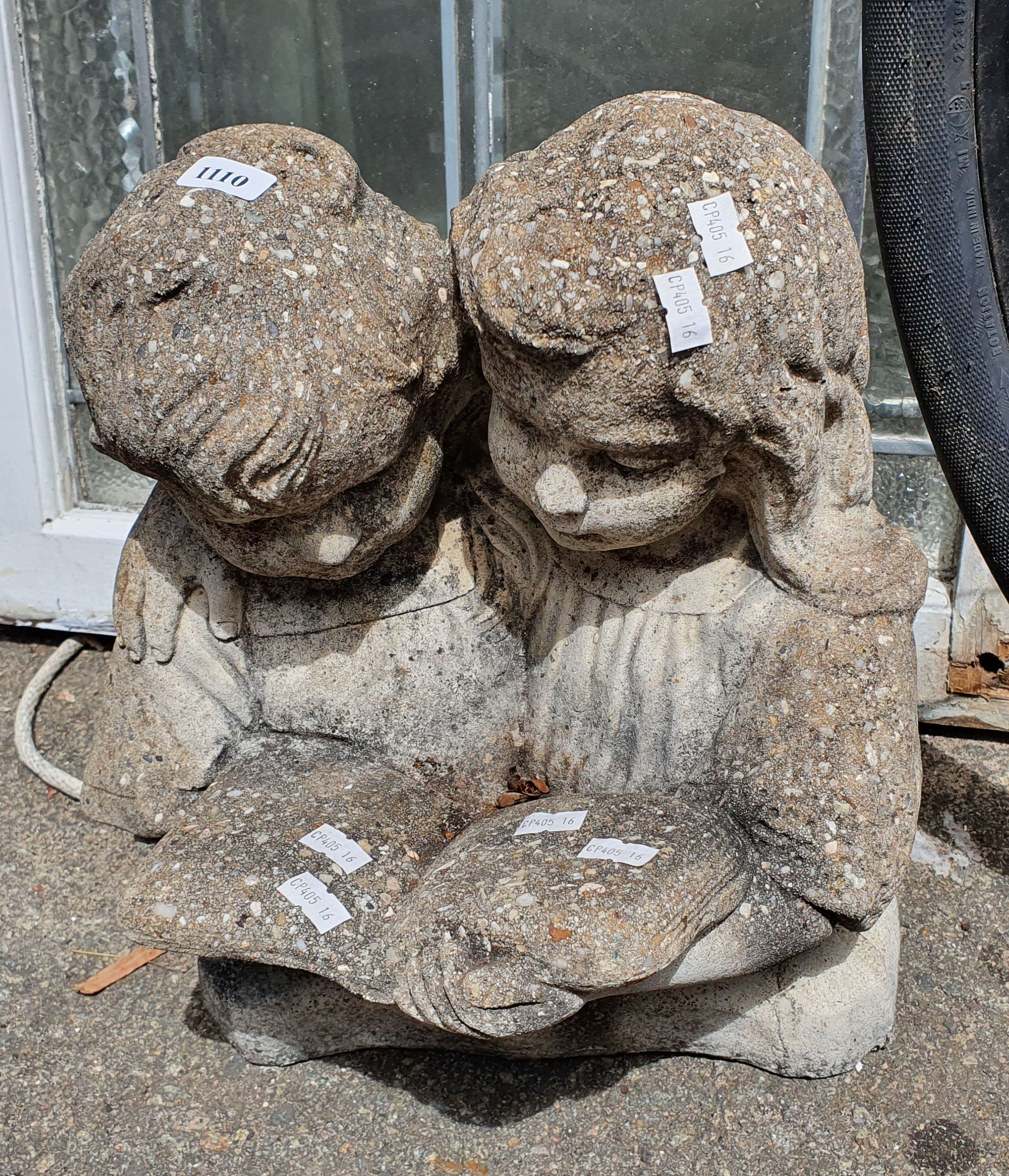 1110 · A GARDEN STATUE
