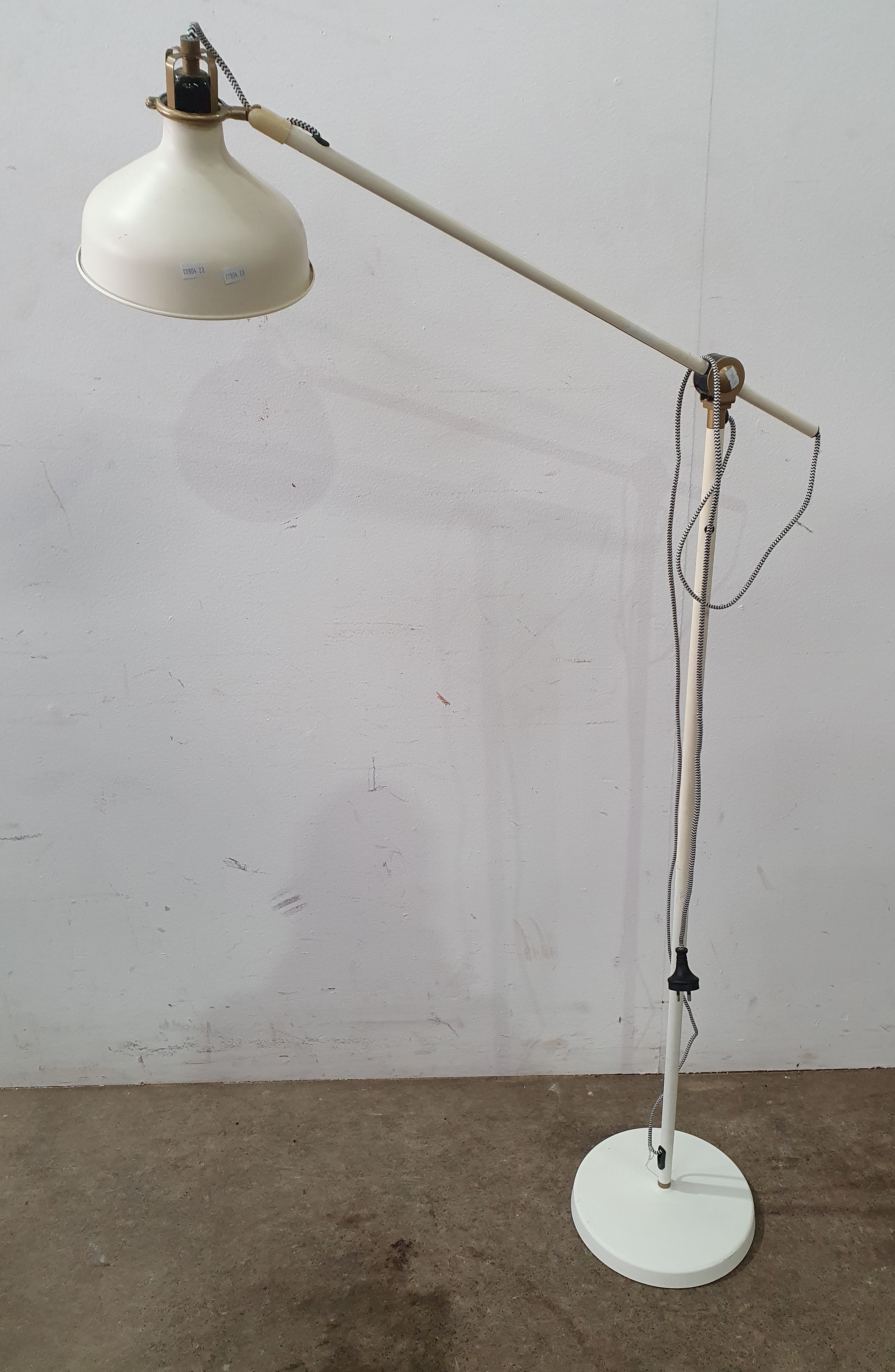 AN ANGLE FLOOR LAMP