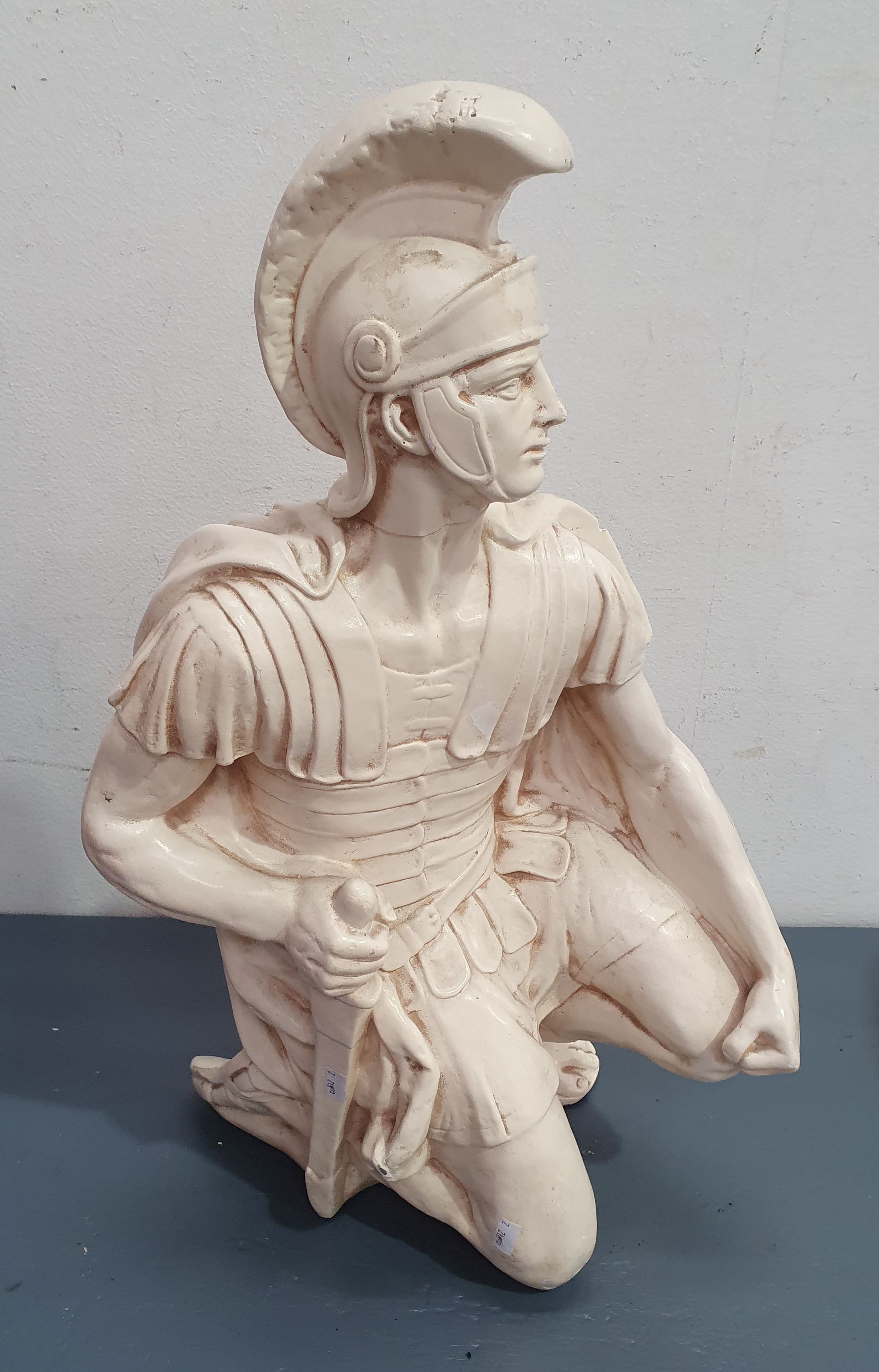 A Painted Plaster Figure Of A Gladiator
