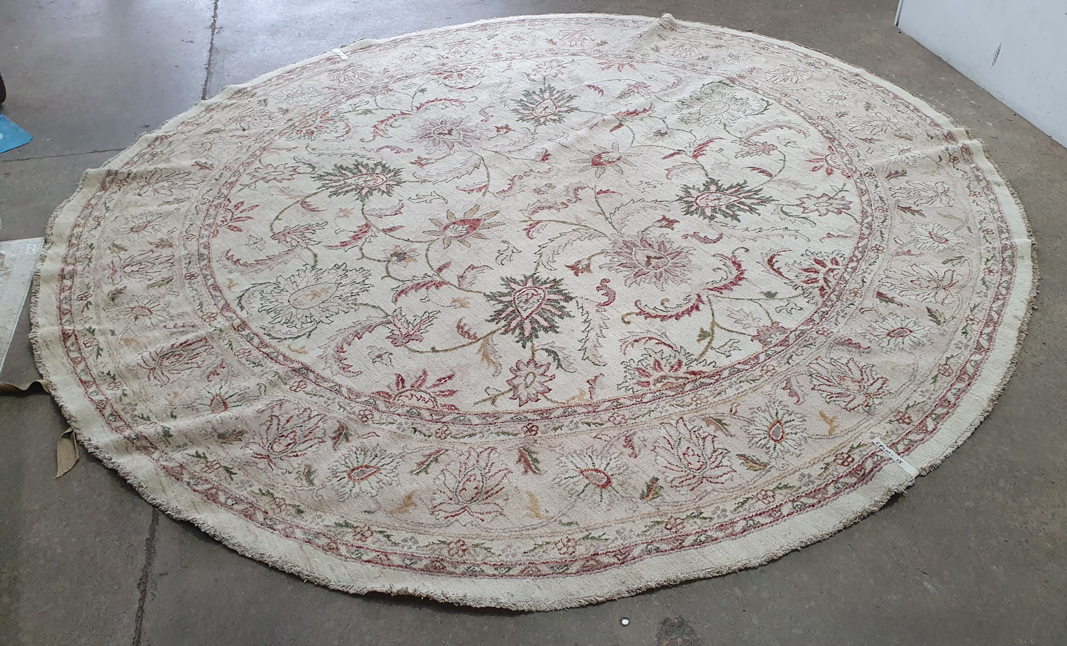 A Large Oval Handmade Rug