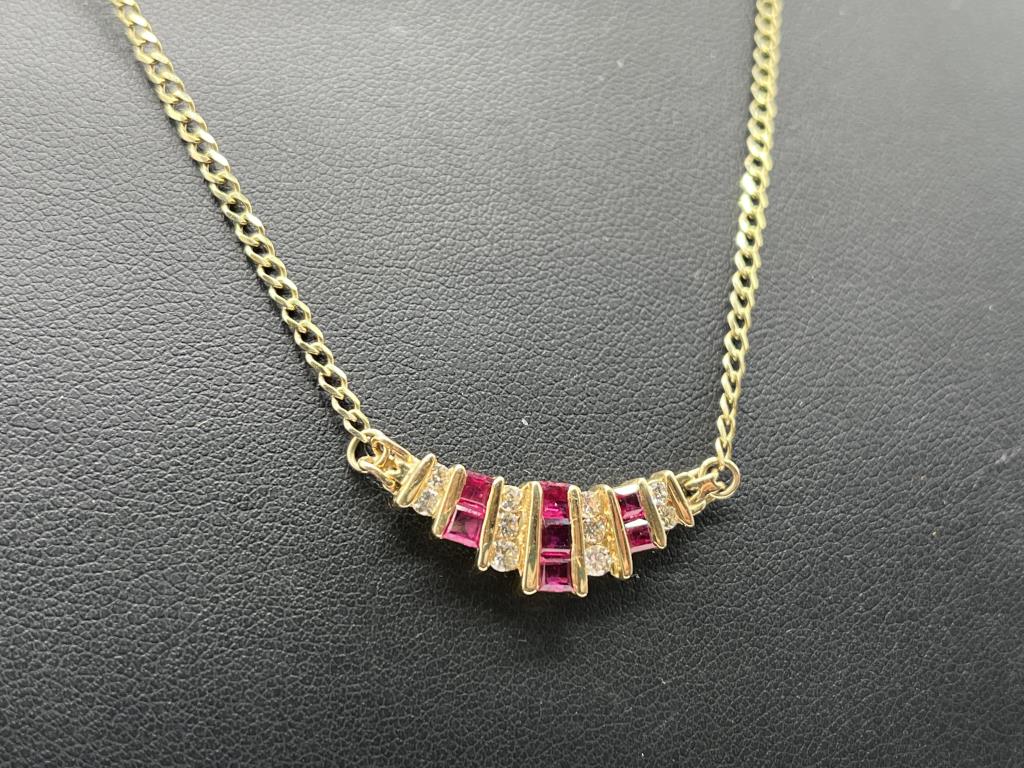 14K YELLOW GOLD RUBY AND DIAMOND NECKLACE | Lightning Auctions Inc