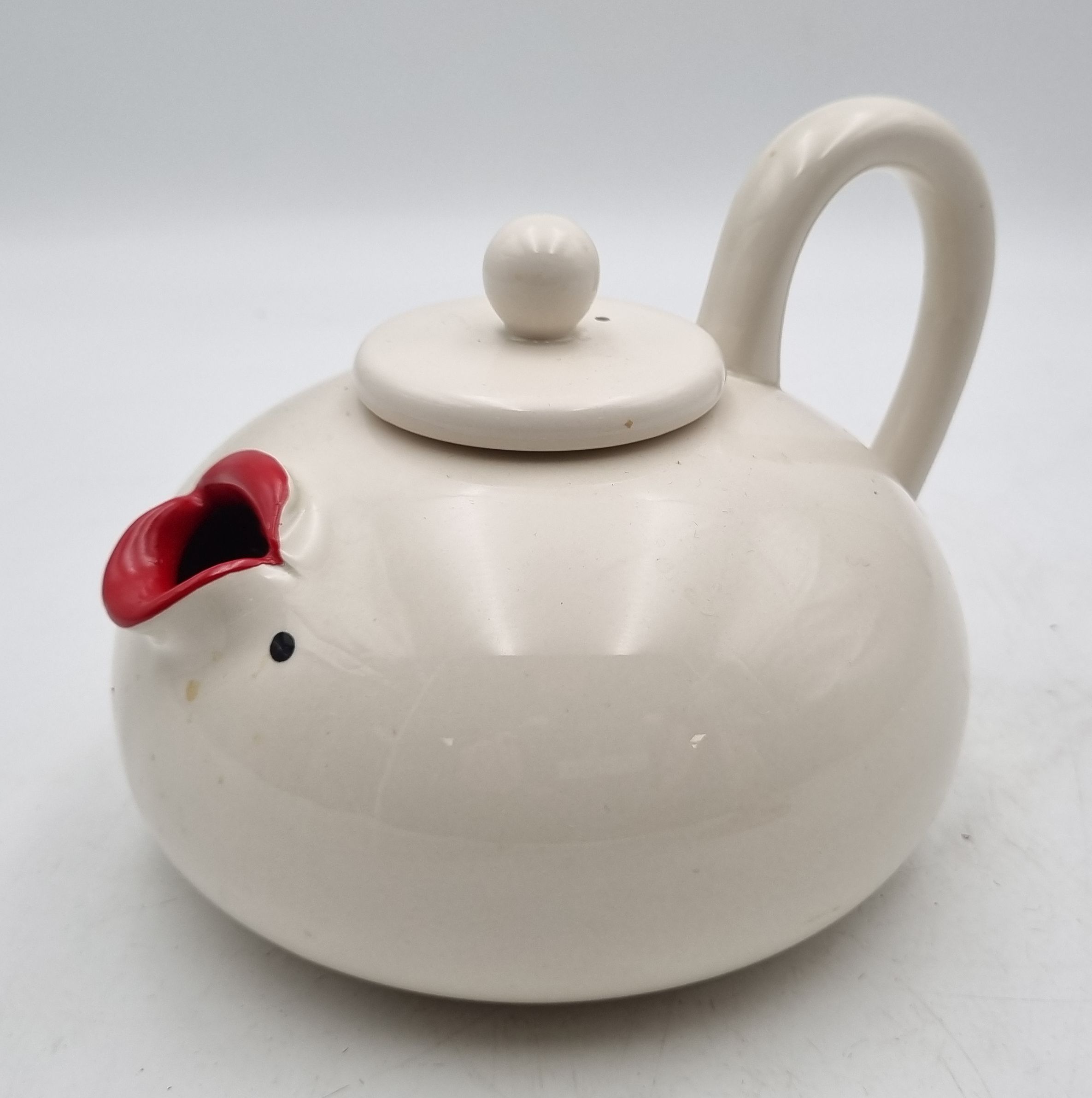 159 · A FITZ AND FLOYD CERAMIC 'LIP SERVICE TEA POT'