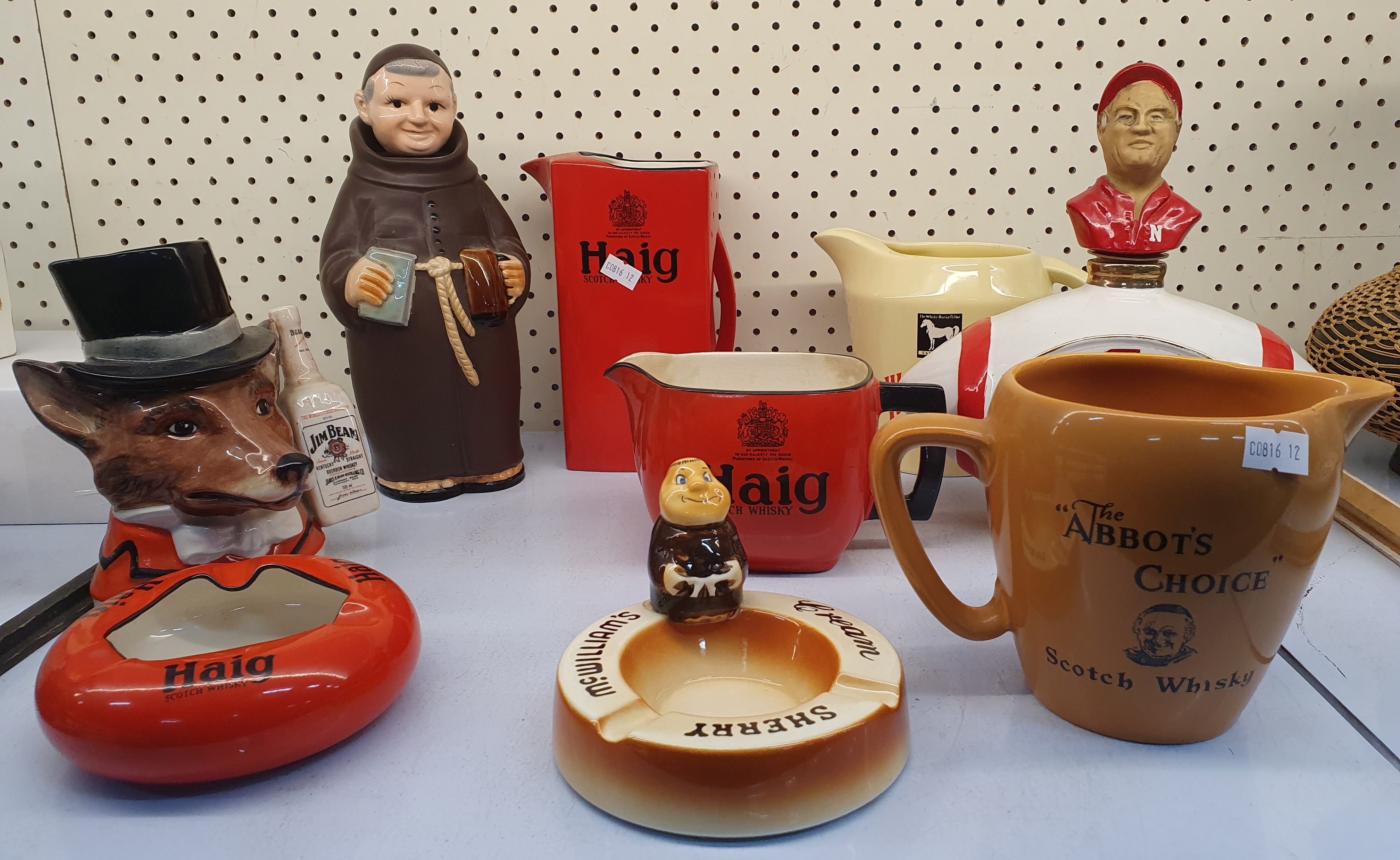55 · A GROUP OF ADVERTISING BAR WARE