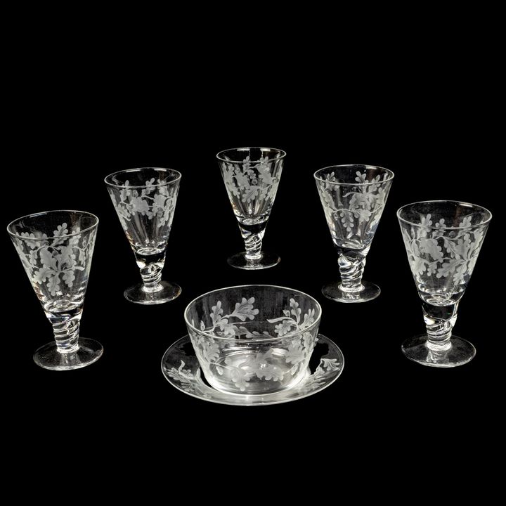 A suite of Webb engraved glass stemware