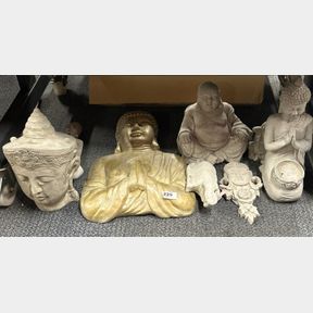 A group of concrete Buddha garden figures, largest. 50cm.