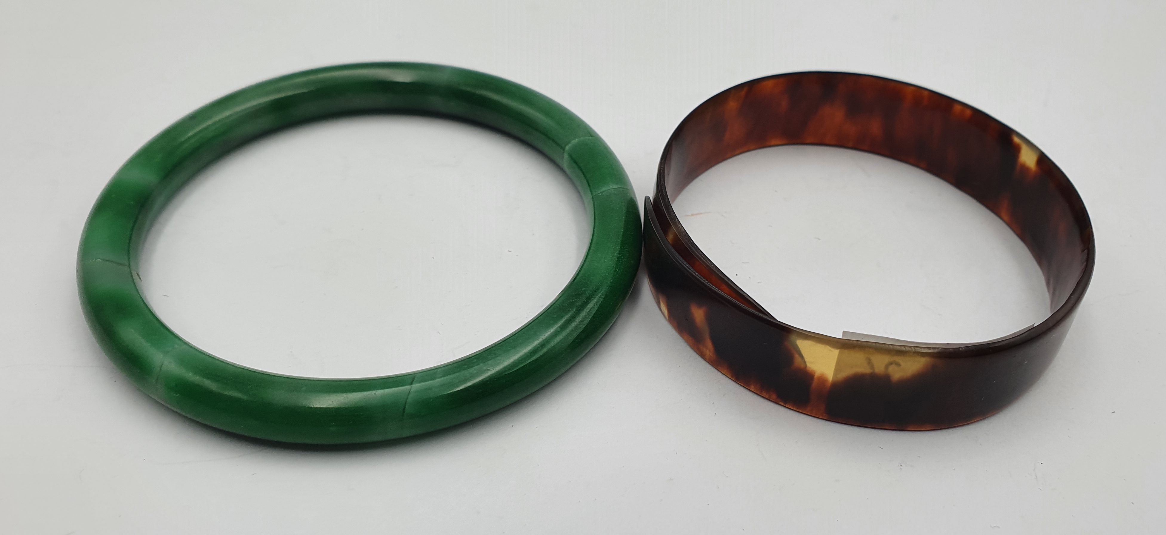 270 · A CHINESE TORTOISE SHELL BANGLE TOGETHER WITH ANOTHER