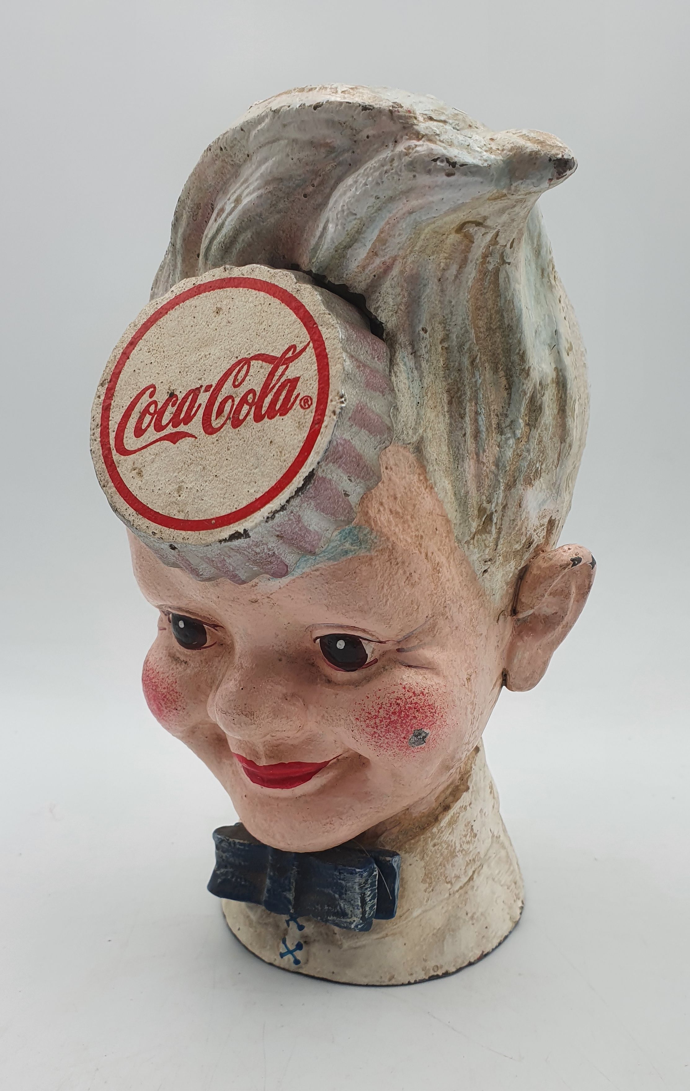 1A · A REPRODUCTION CAST IRON COCA COLA MONEY BANK