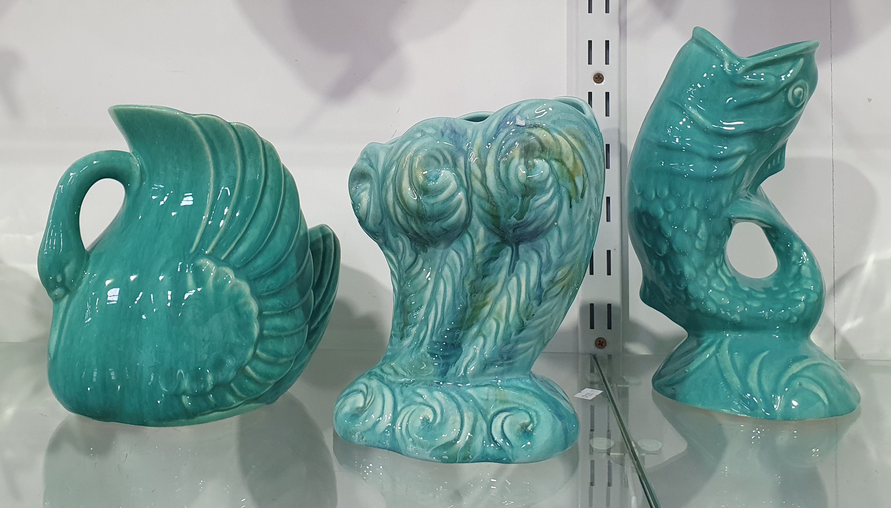 701 · THREE MCP POTTERY TEAL VASES