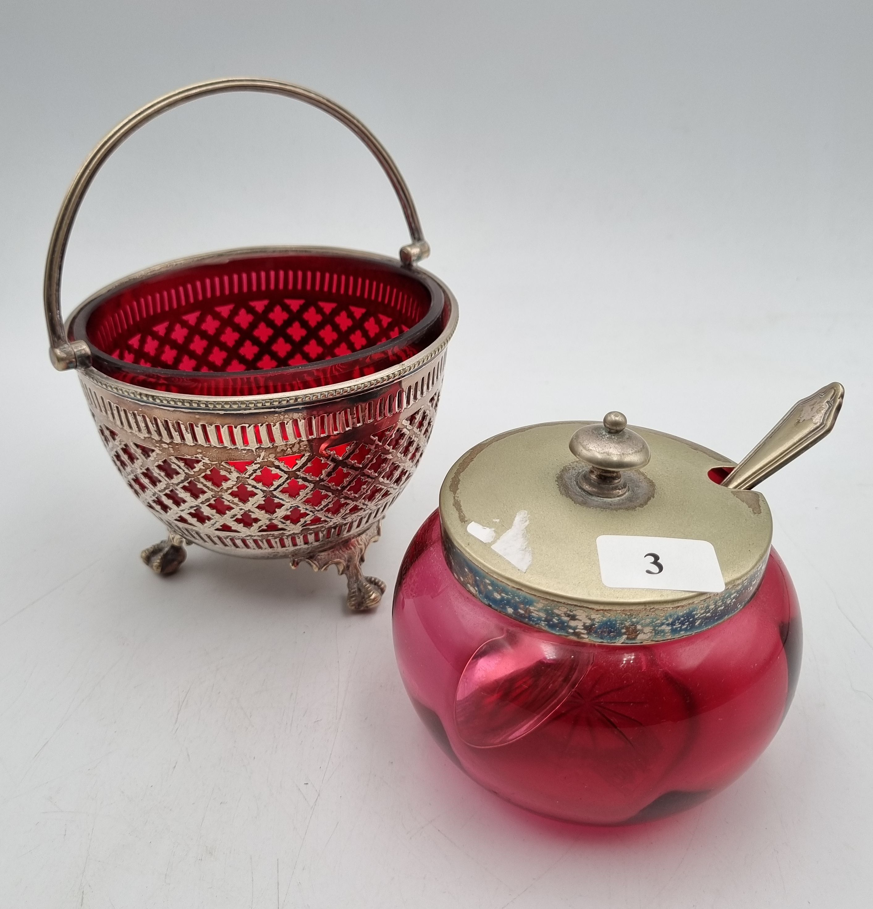3 · A RUBY GLASS AND SILVER PLATED SUGAR BASKET