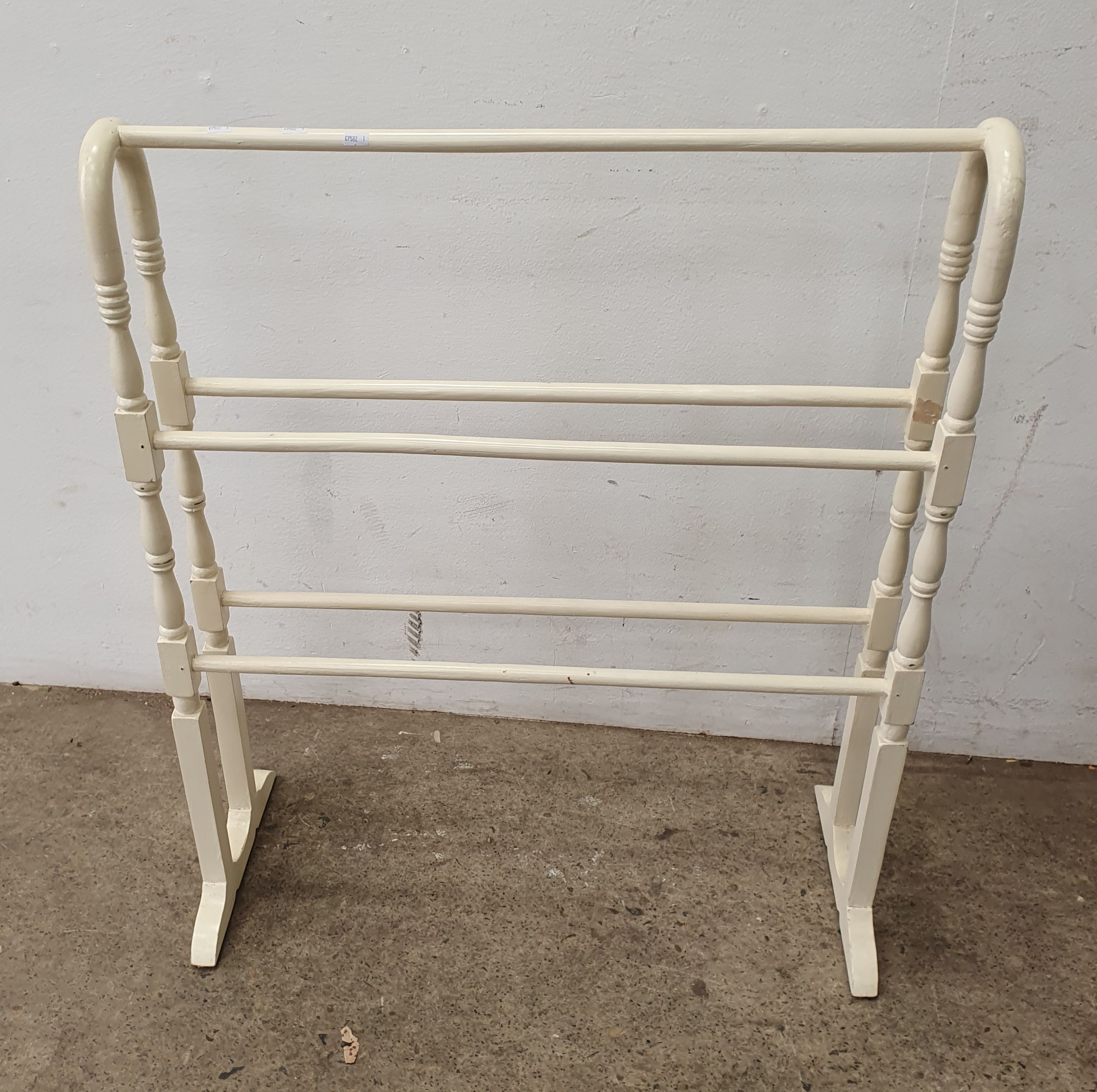 A White Painted Towel Rack