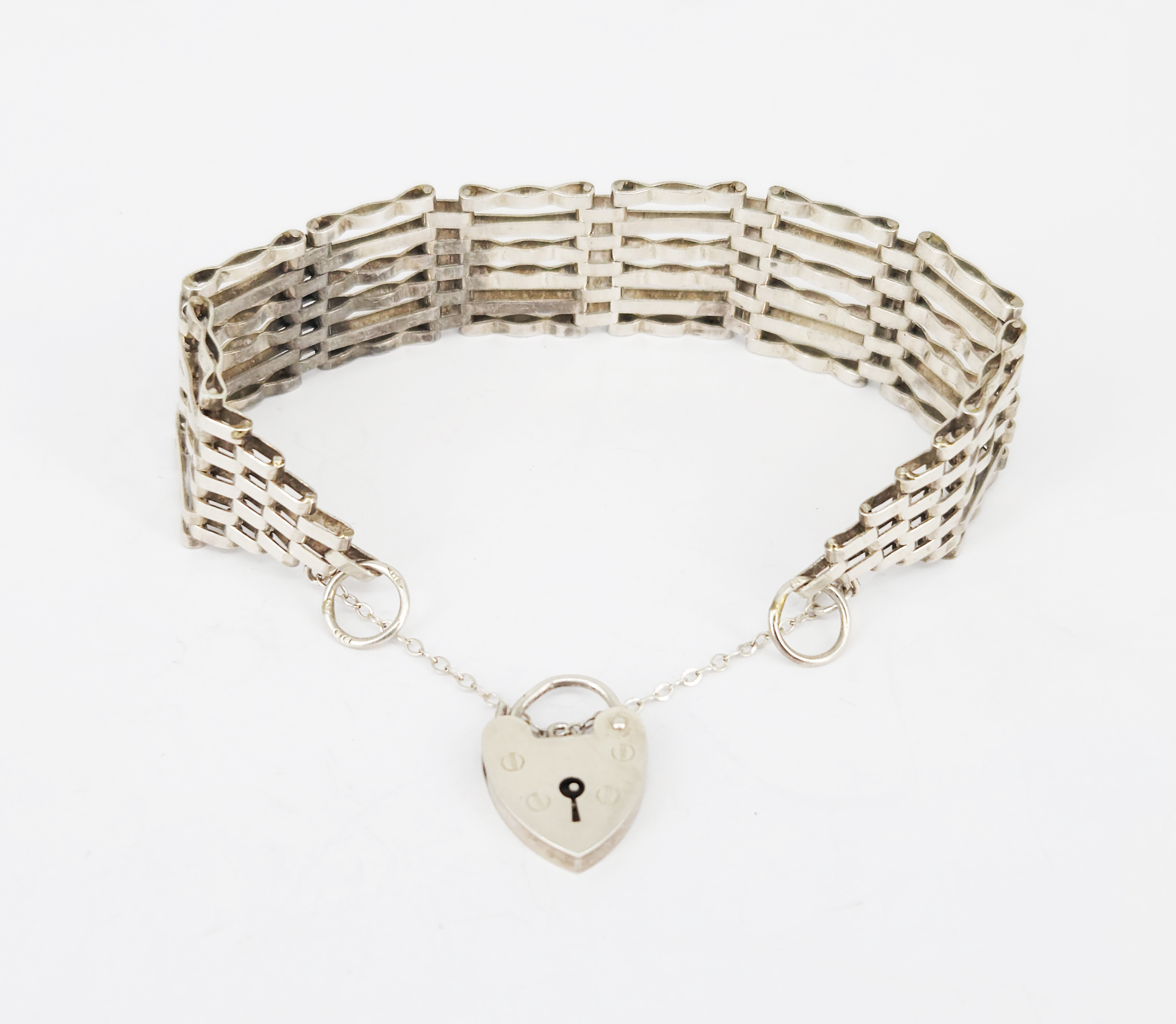 358 · A VINTAGE STERLING SILVER GATE-LINK BRACELET