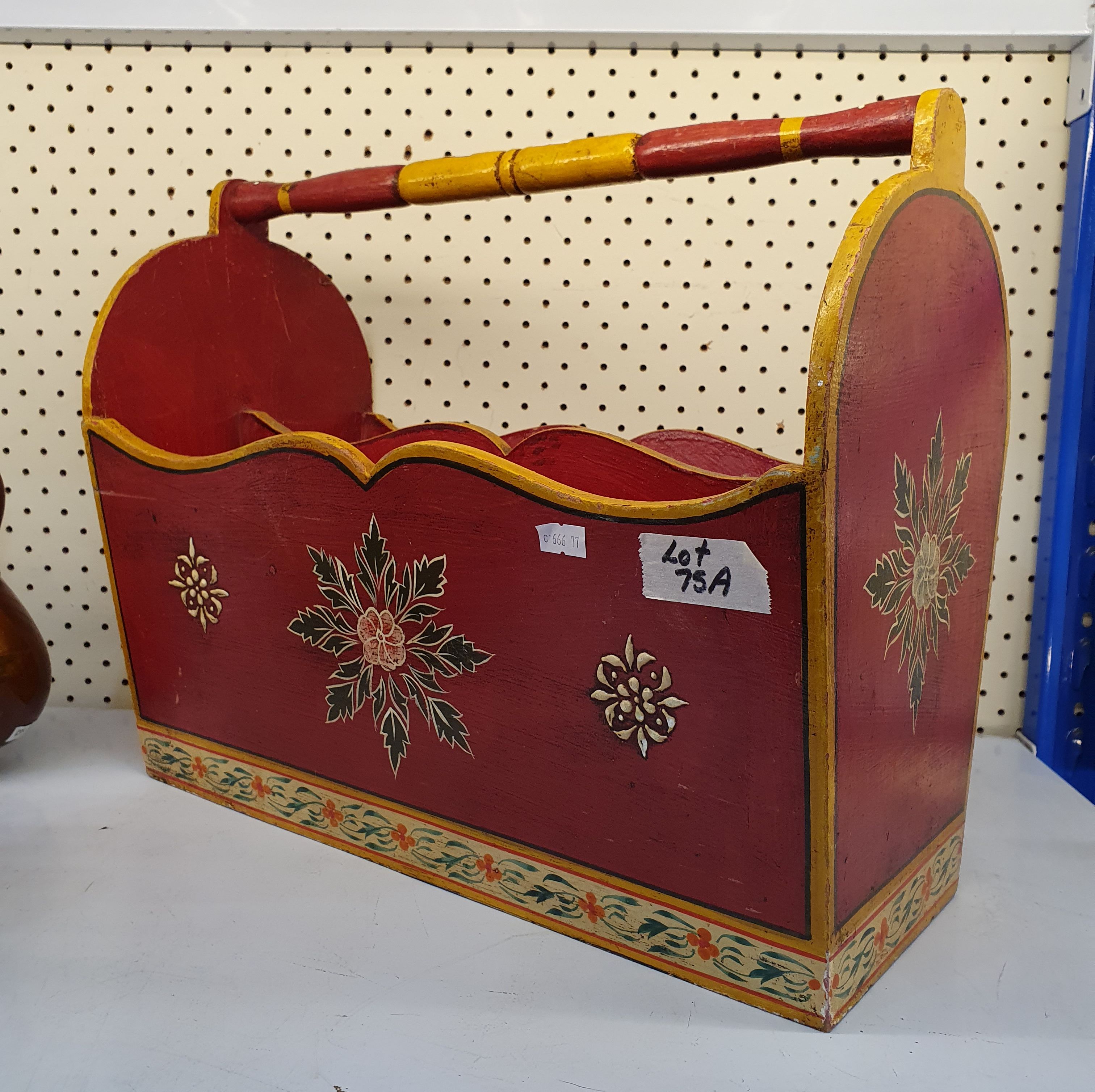 75A · A HAND PAINTED MAGAZINE RACK