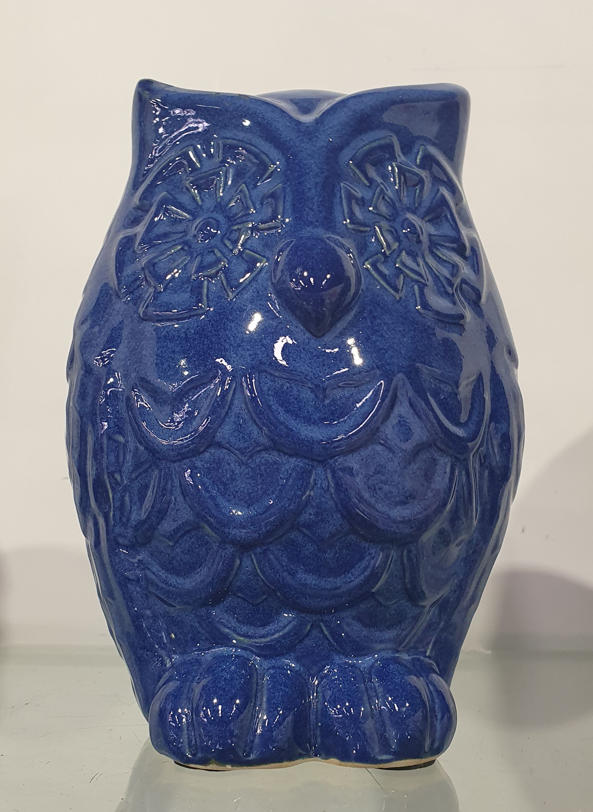 A BLUE GLAZED CERAMIC OWL FIGURE