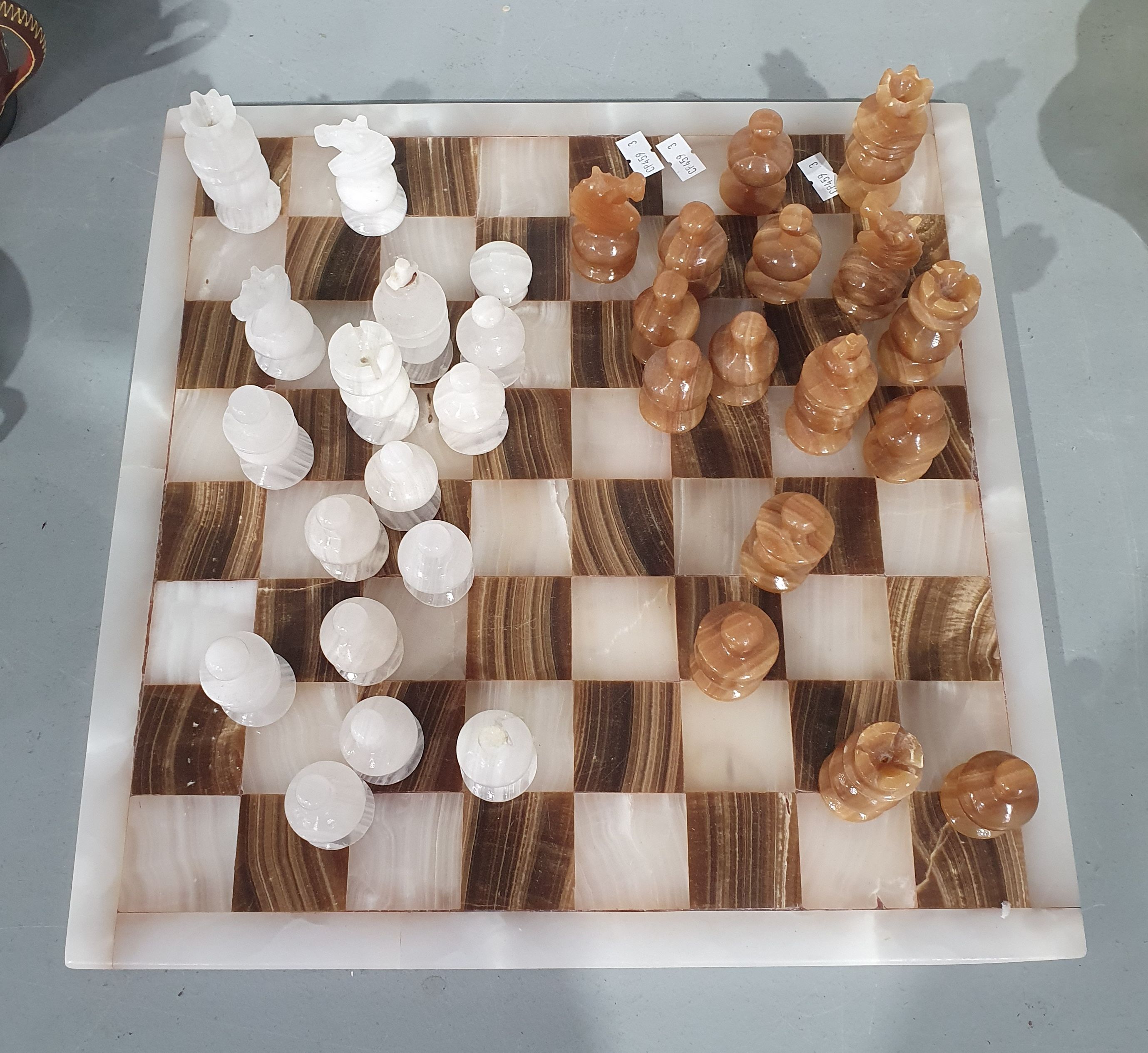AN ONYX AND ALABASTER CHESS SET