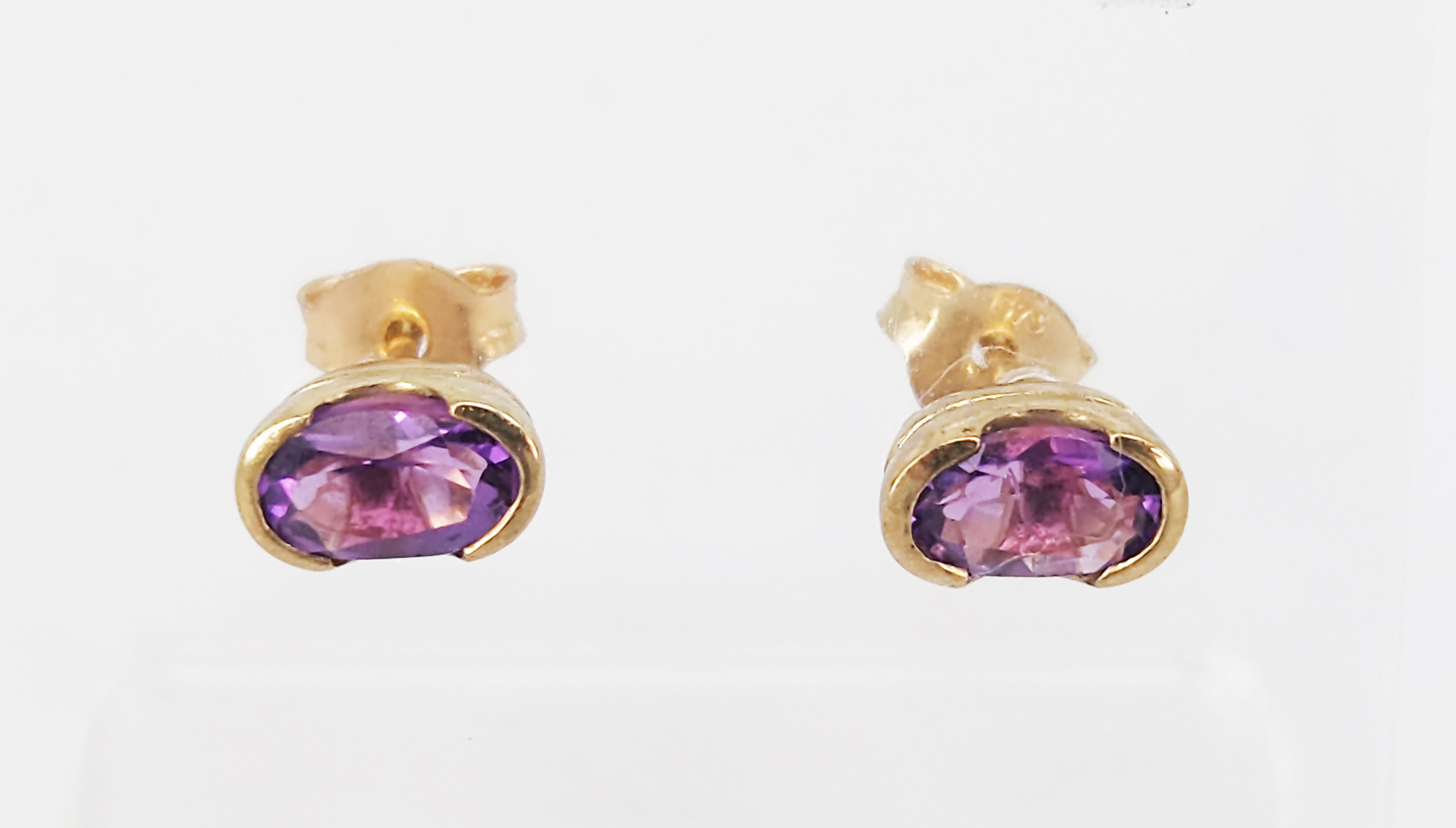 347 · A PAIR OF 9ct YELLOW GOLD AMETHYST EARRINGS