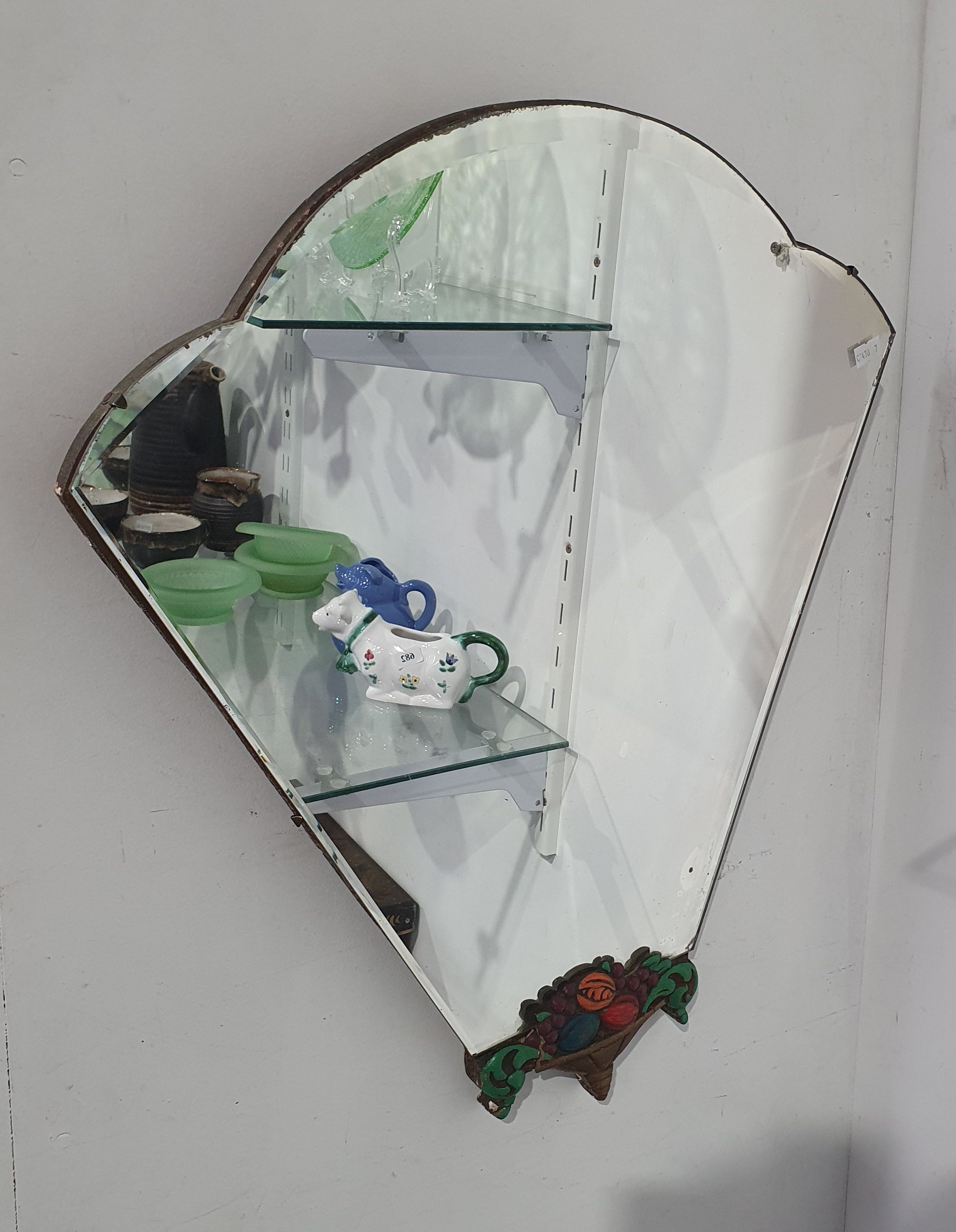 679 · AN ART DECO FAN MIRROR