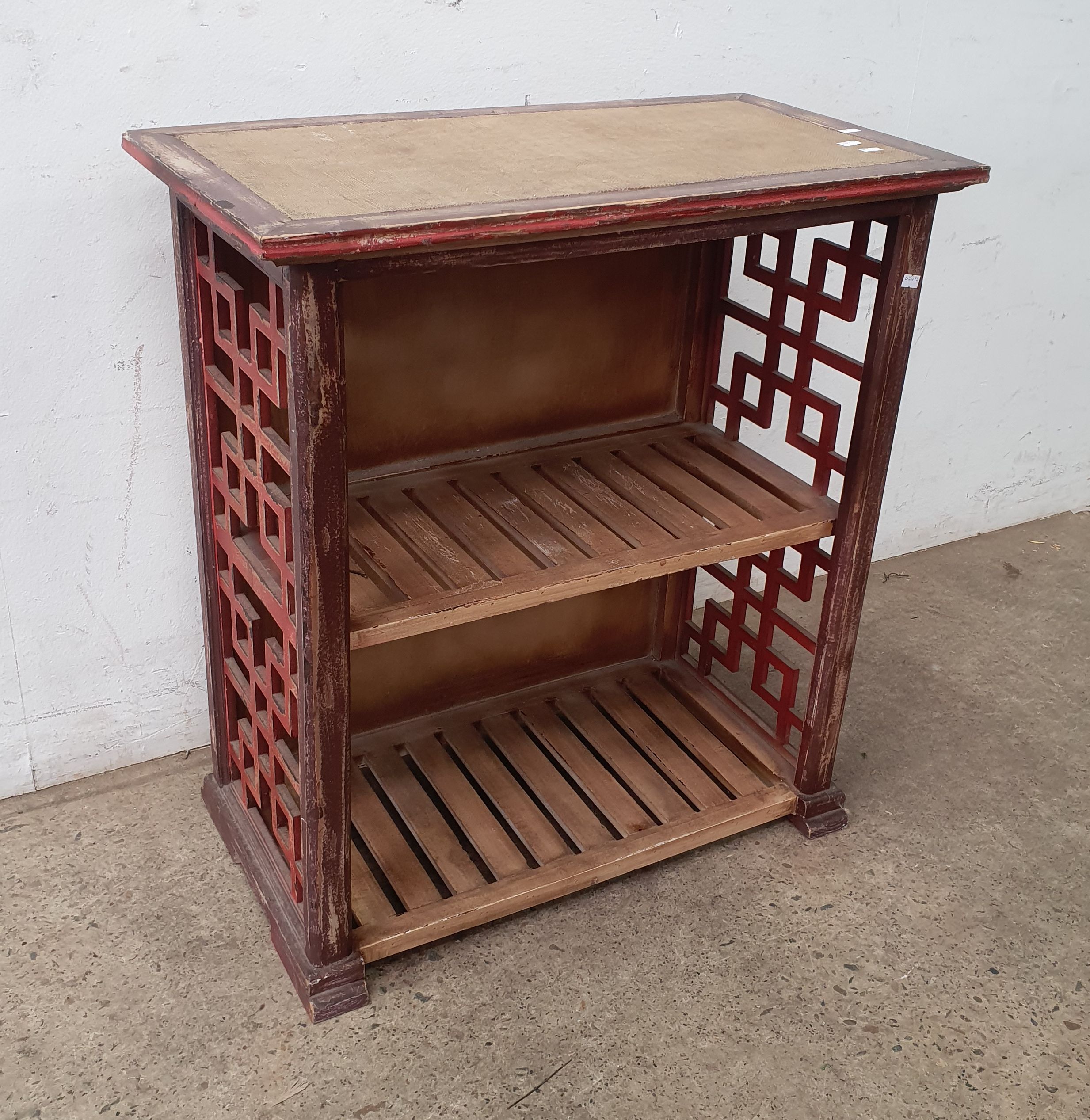 AN ORIENTAL STYLE TWO TIER BOOKCASE