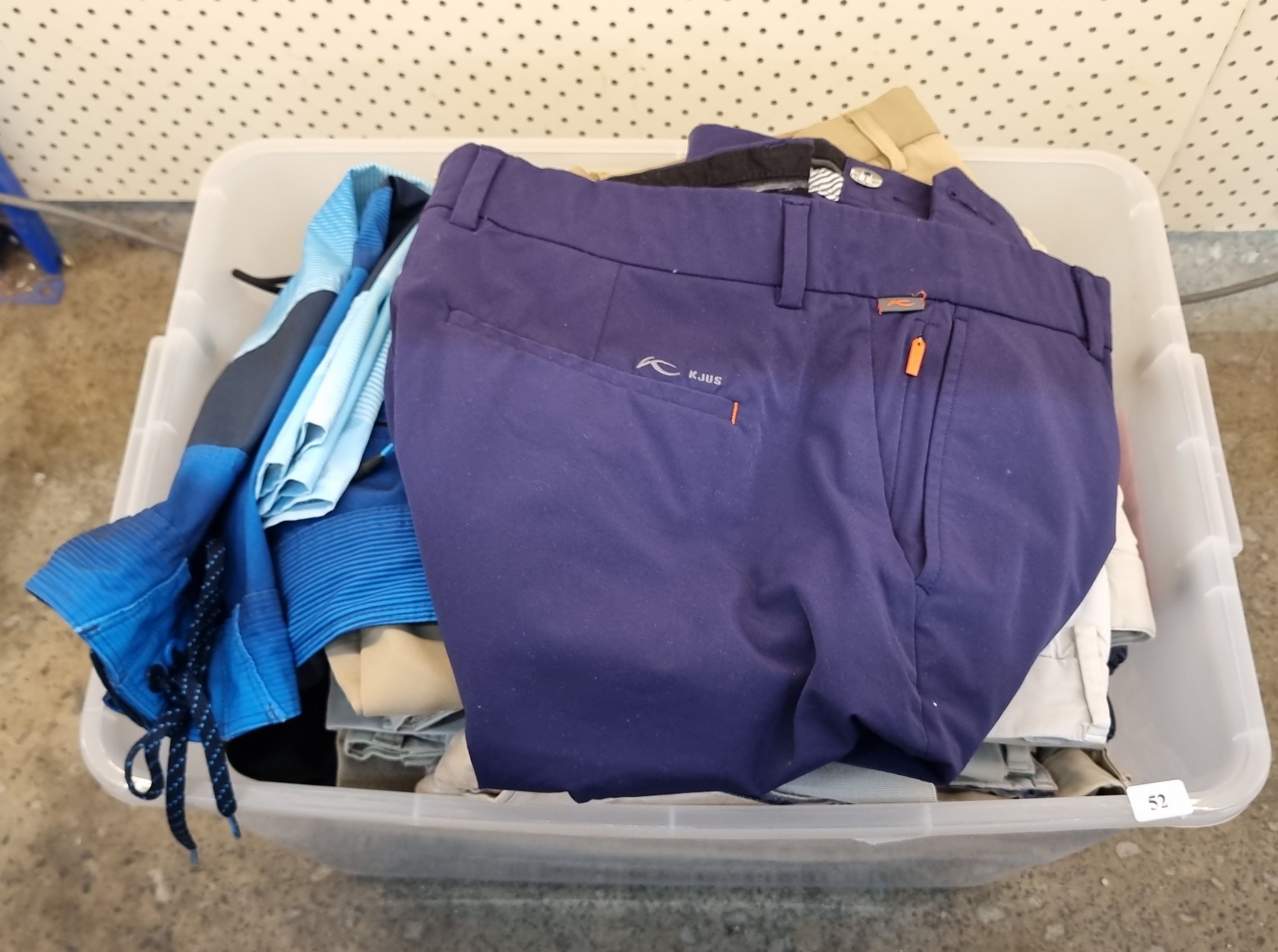 52 · A GROUP OF MENS TROUSERS AND SHORTS