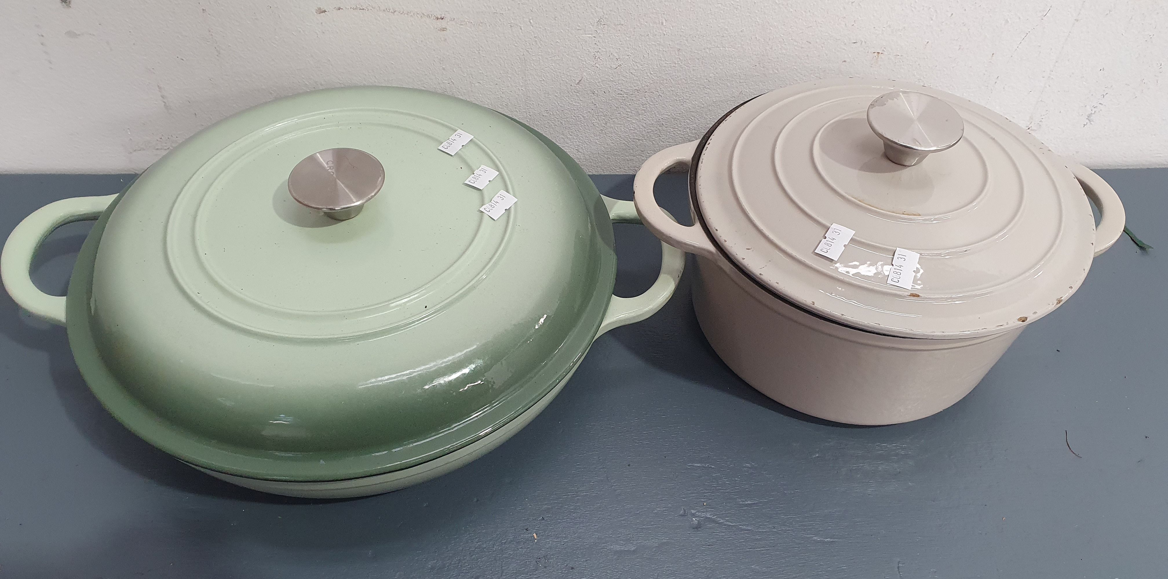 A Group Of Cast Iron Pots