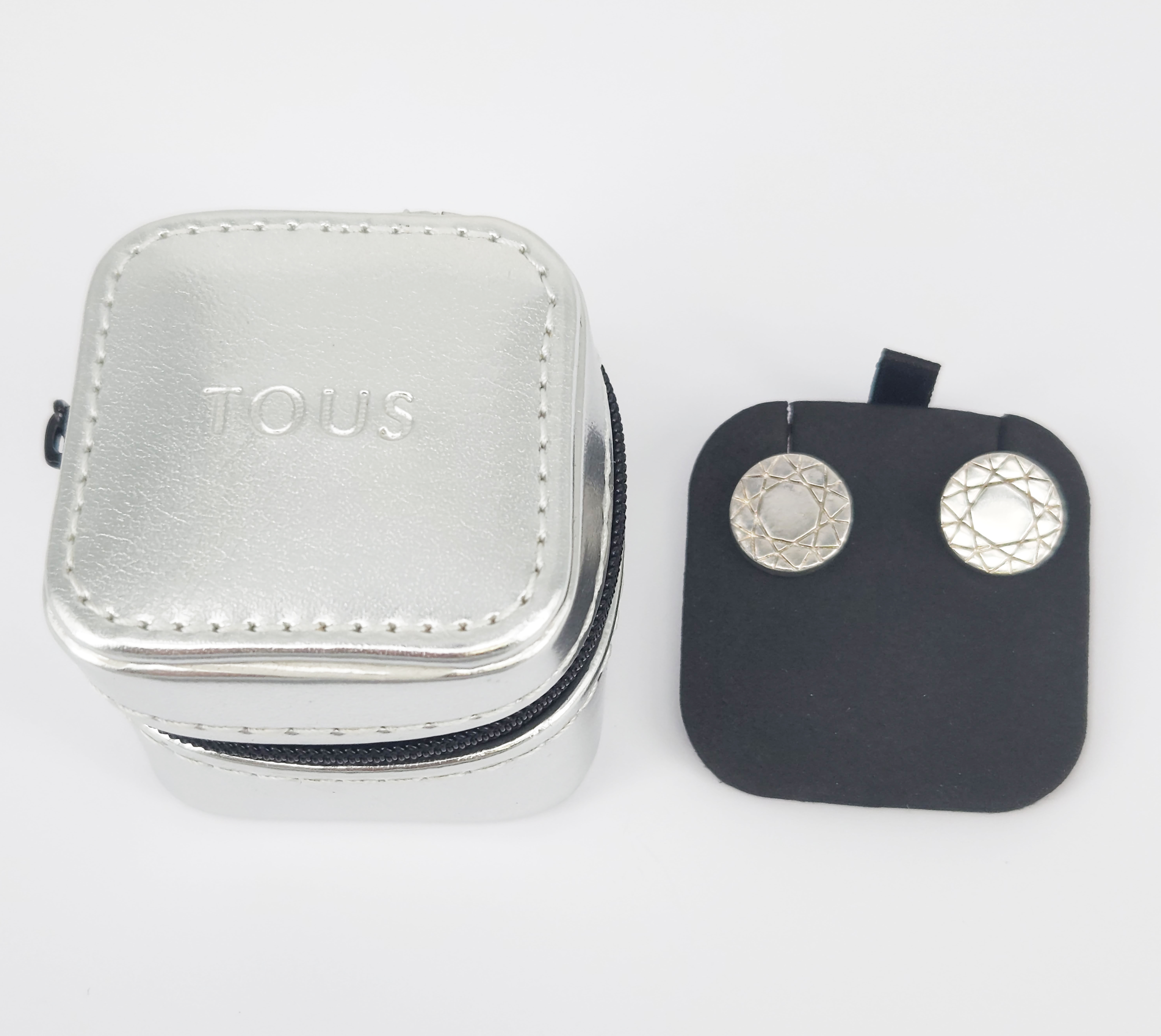 A Pair Of Sterling Silver Stud Earrings