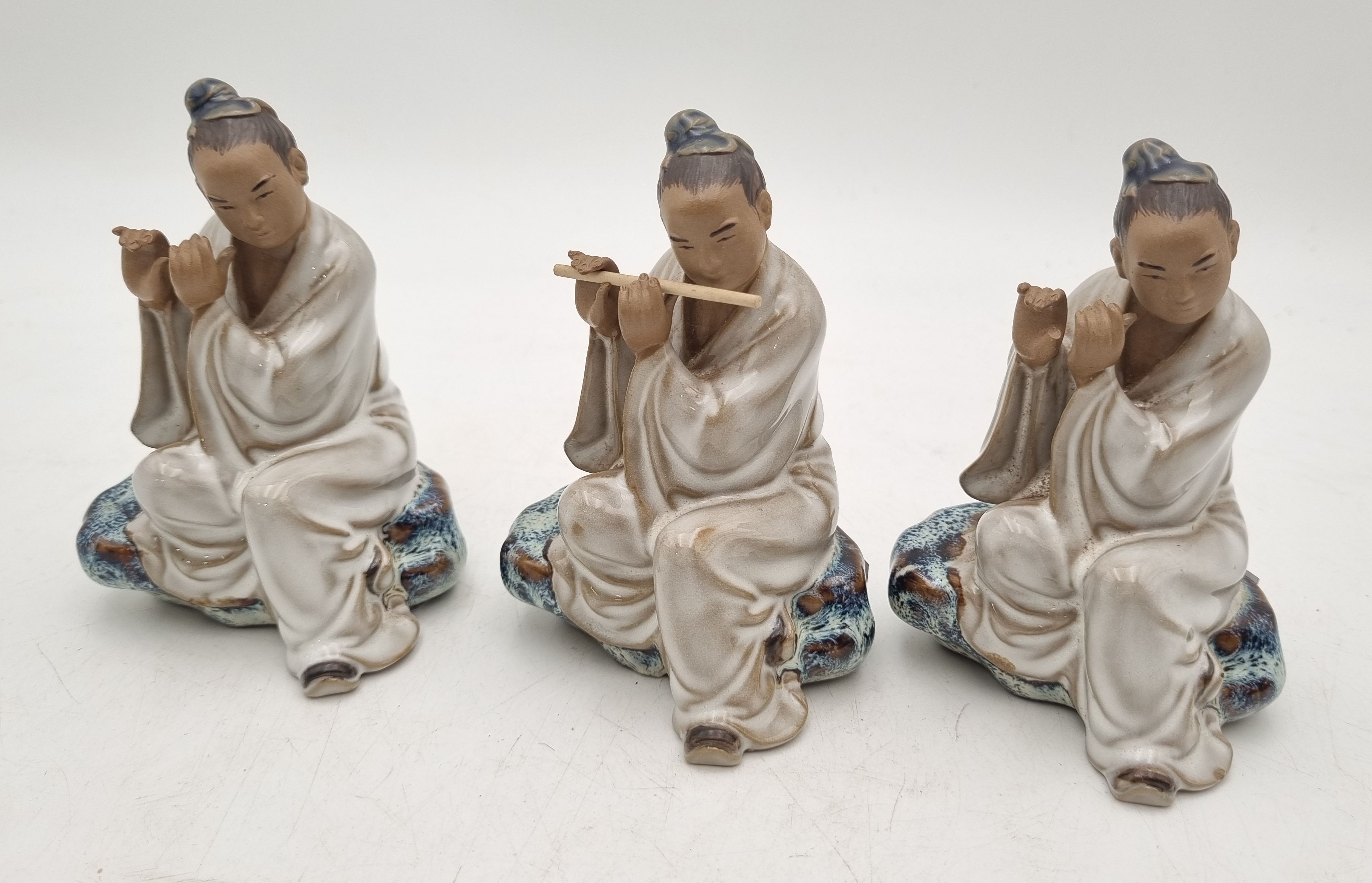 THREE CHINESE FIGURES OF FLAUTISTS