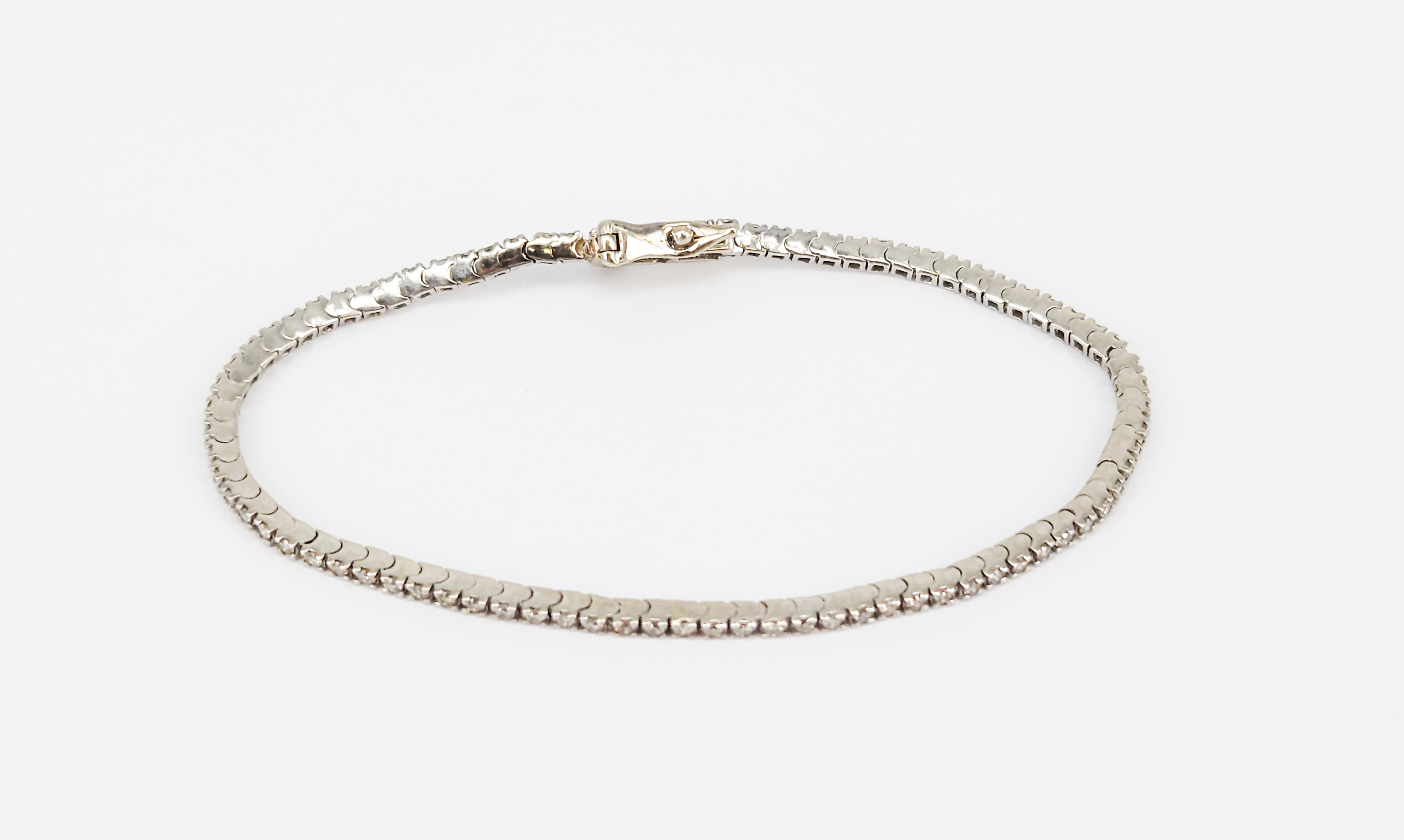 A 10k White Gold And Diamond Tennis Bracelet