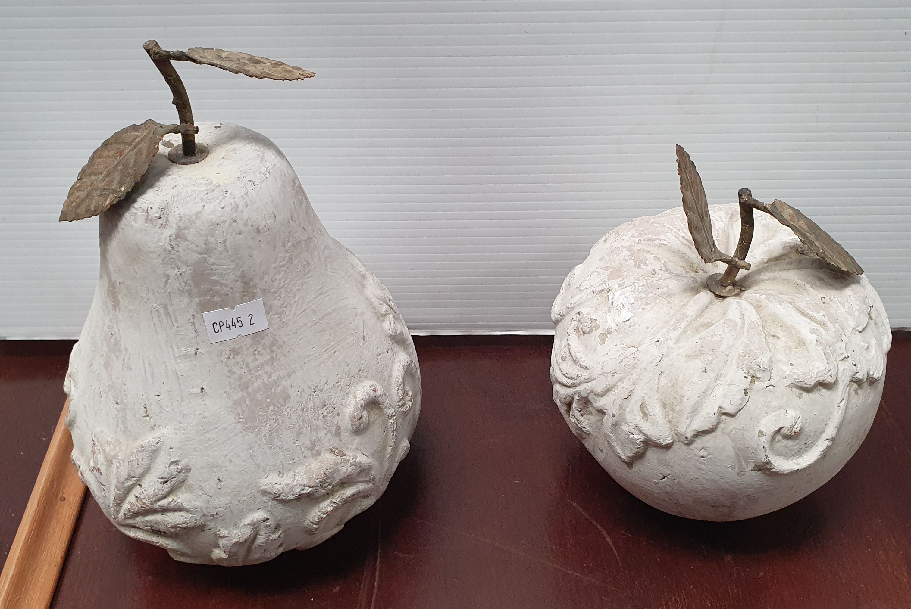146 · TWO COMPOSITE STONE DECORATIVE FRUIT