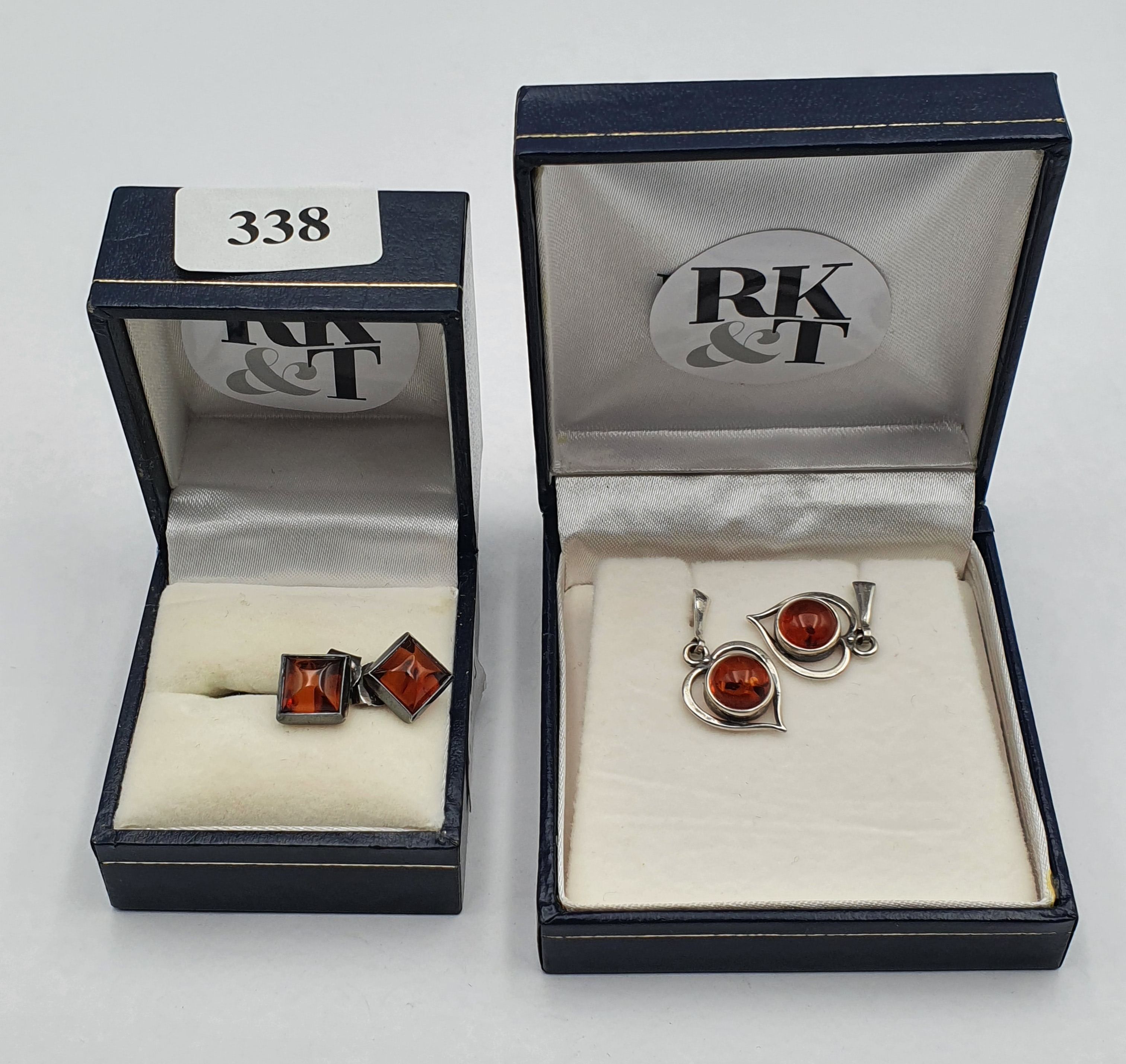 349 · TWO PAIRS OF SILVER AND AMBER EARRINGS