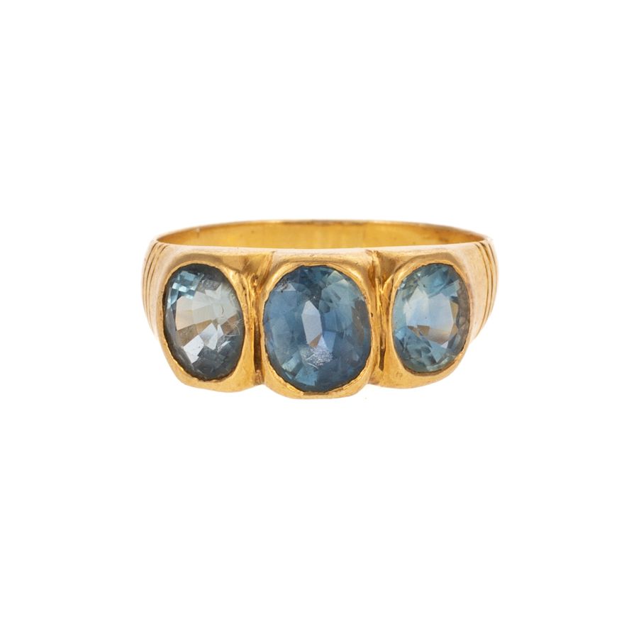 A Bezel Set Sapphire Ring in 18K
