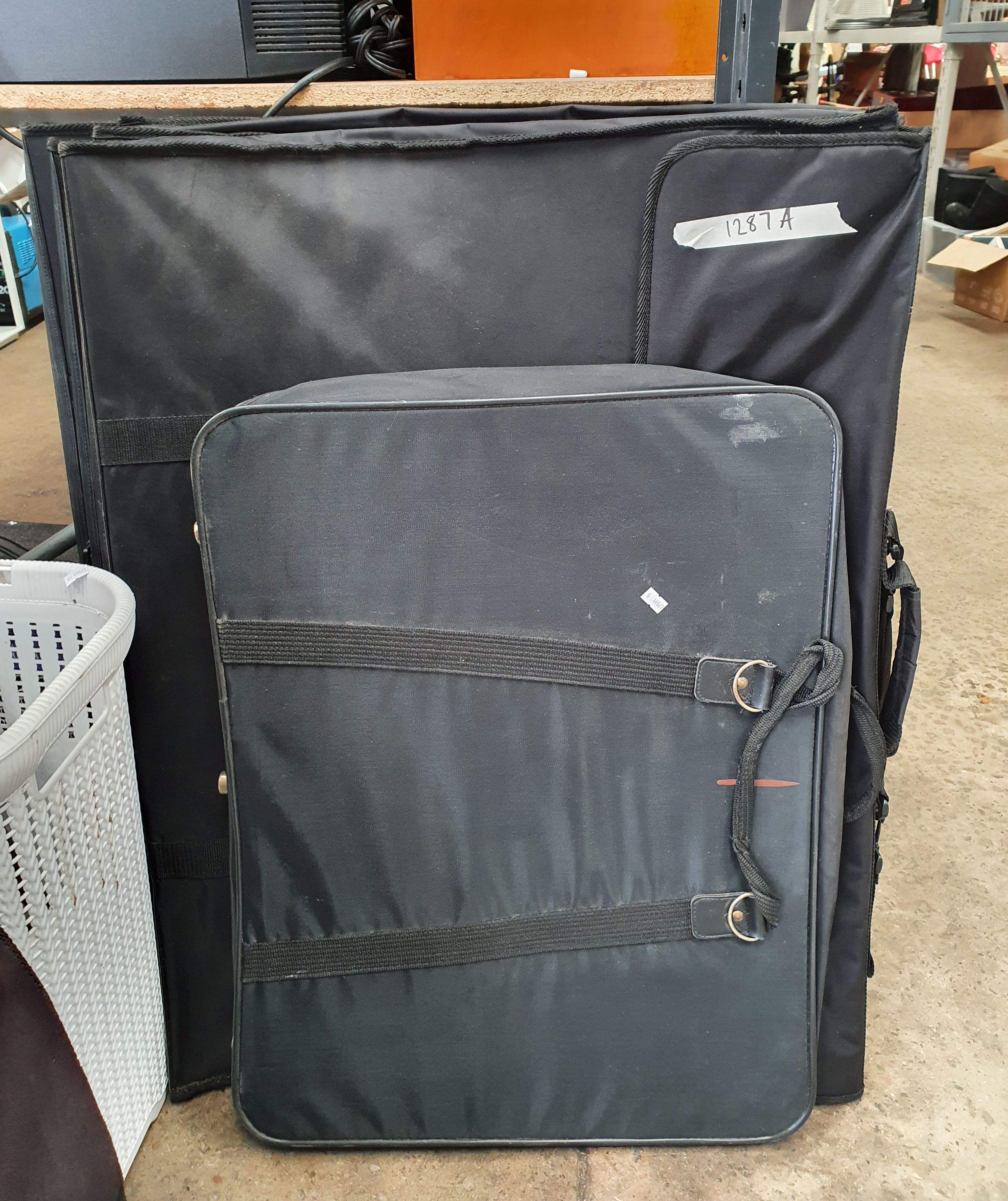 A GROUP OF VARIOUS ARTIST ARTWORK CARRY FOLDERS