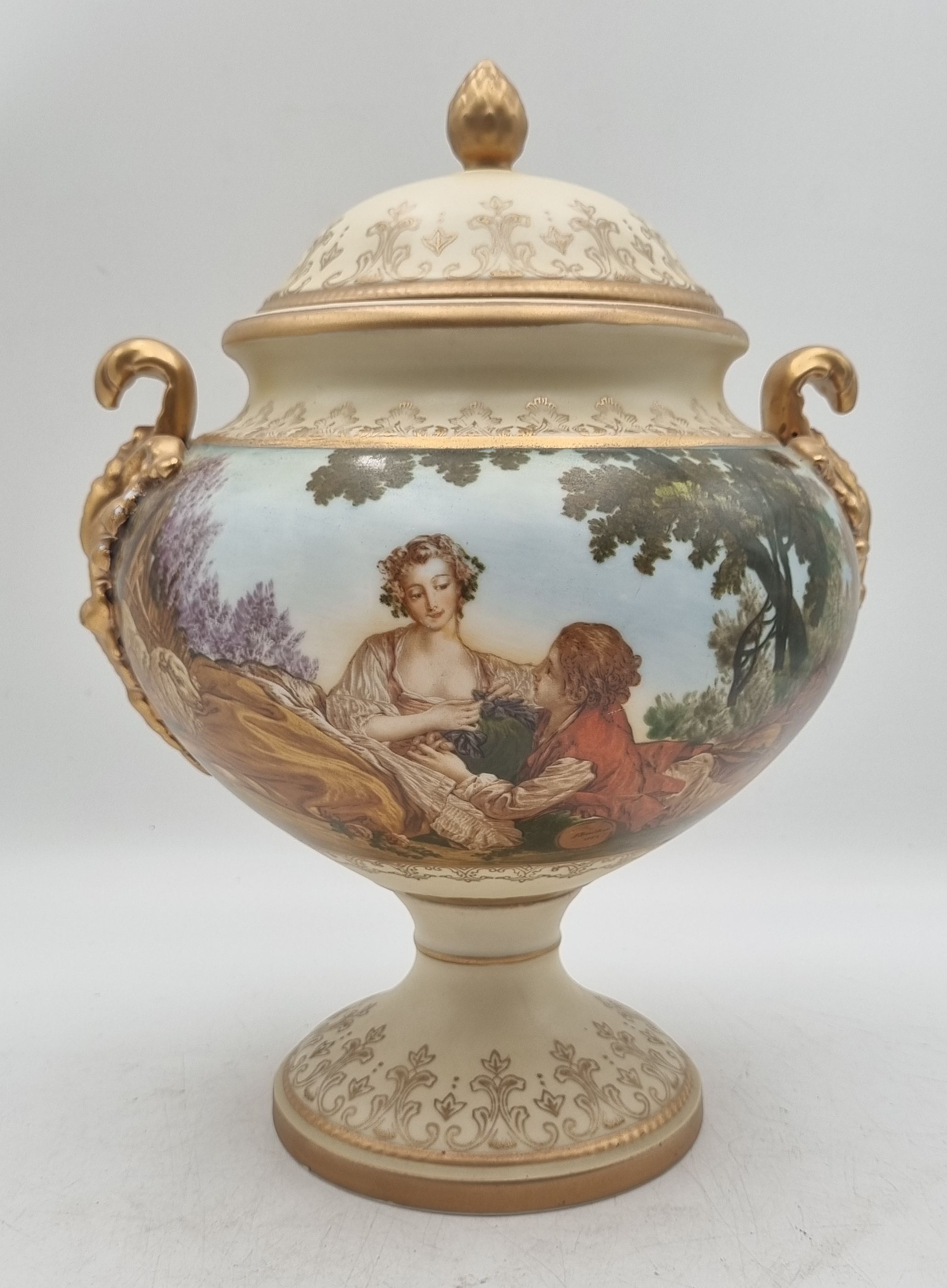 A CONTINENTAL PORCELAIN URN AND COVER